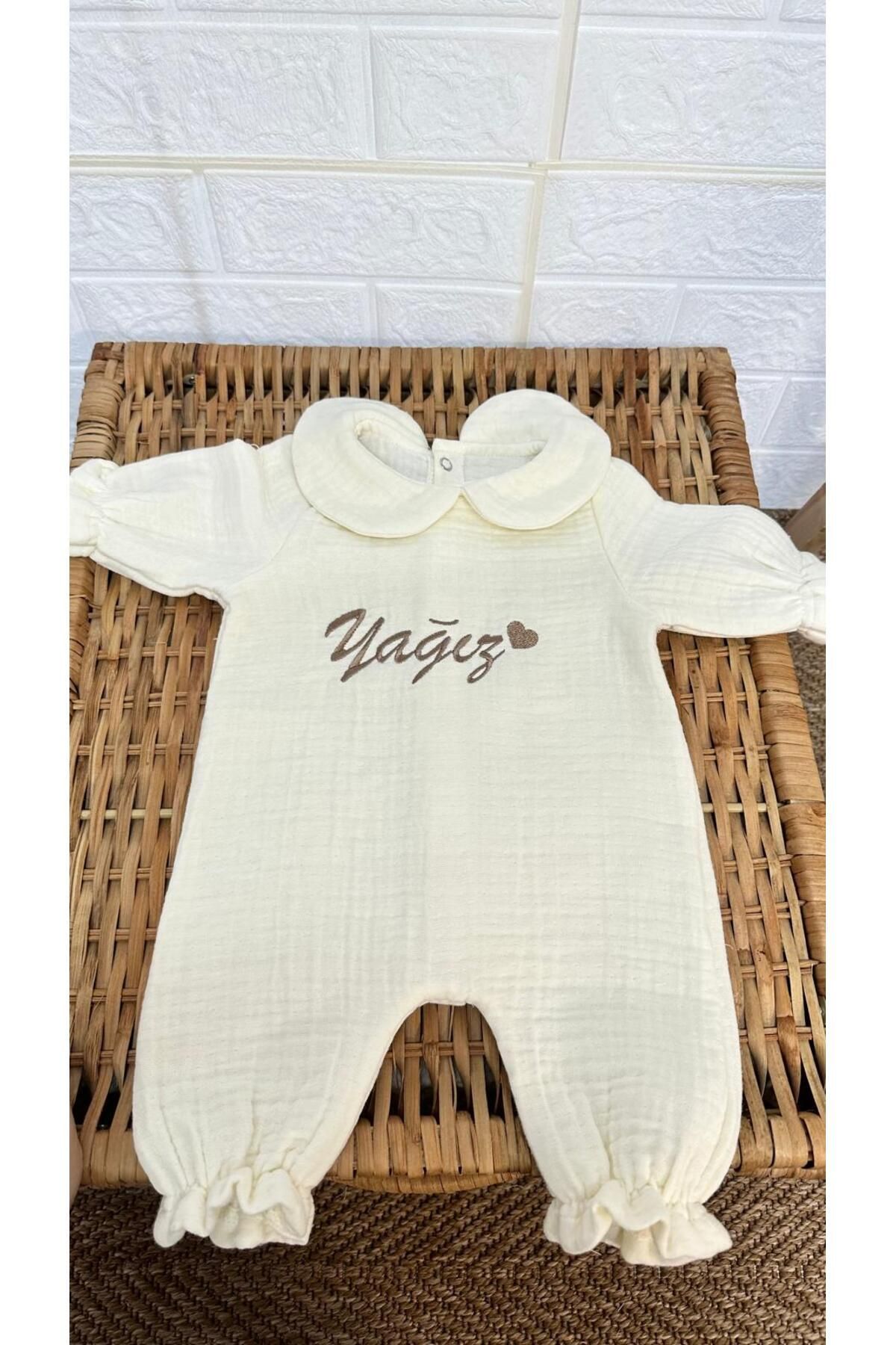 babymotif isimli yeni doğan 4 kat müslin tulum şapka