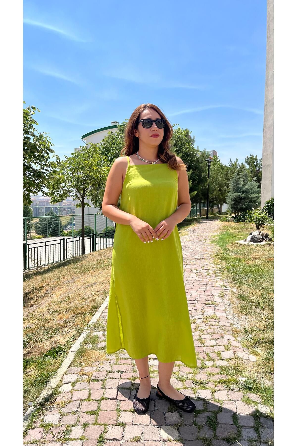 Gizybutik Halter Askılı Müslin Kumaş Yırtmaçlı Elbise