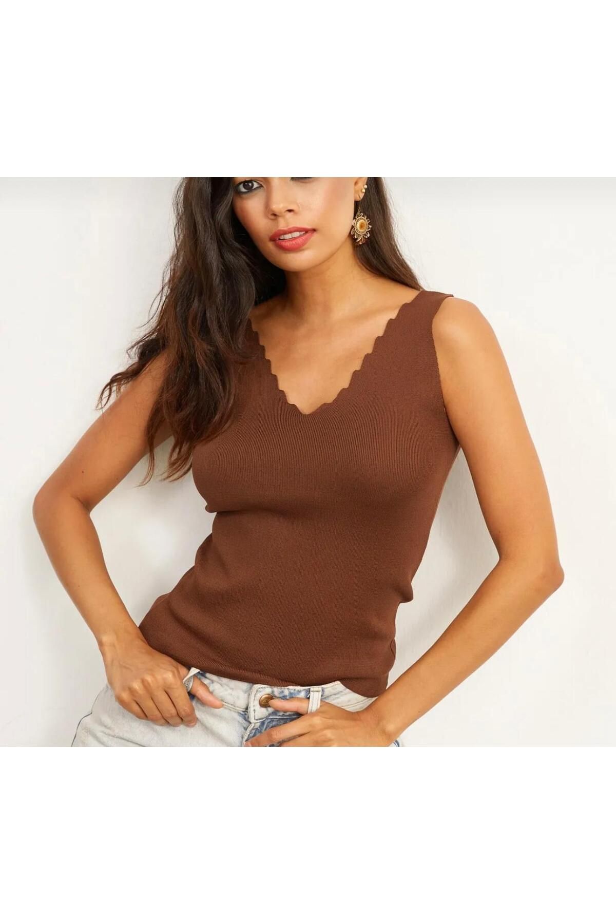 Butik merdiven yaka yazlık triko bluz