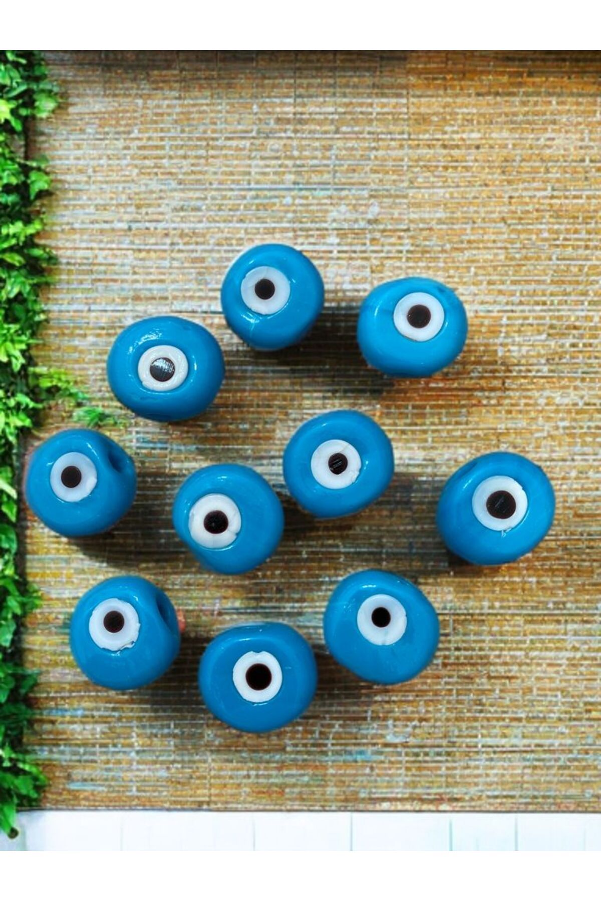 Home 10 Adet Mavi Danagöz Cam Delikli Nazar Boncuğu. El Yapımı. Ebat 1,5 cm ~ 2,5 cm Arası.