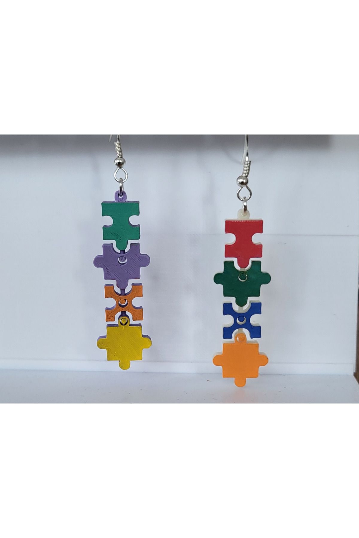 talaşoğlu Jigsaw küpeleri eklemli