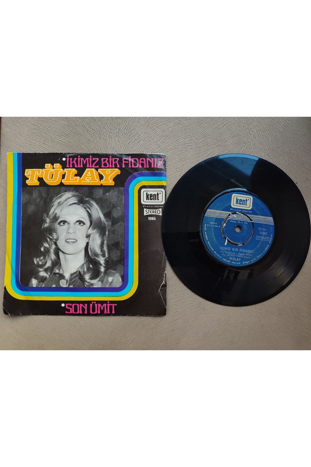 Plakperest TÜLAY - İkimiz Bir Fidanız / Son Ümit- 1975 Türkiye Basım 45lik Plak 2.el