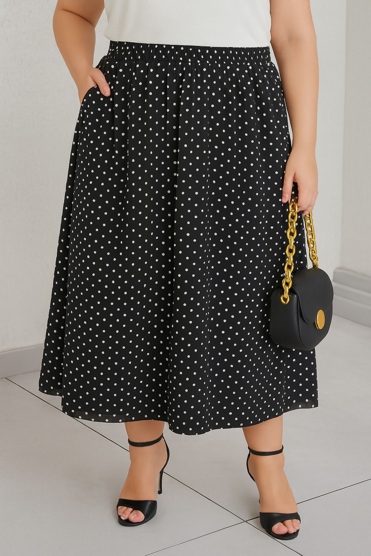 Büyük Moda PUANLI VİSKOZ MİDİ ETEK
