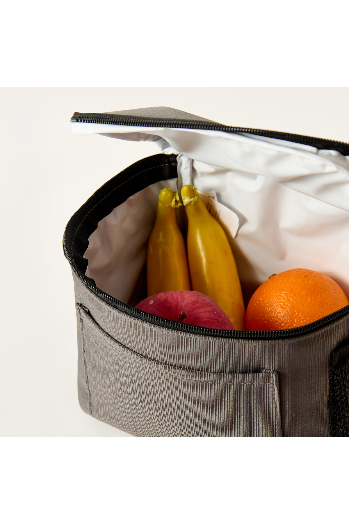 Lifestyle-Solid Lunch Bag with Zip Closure and Side Pockets 4