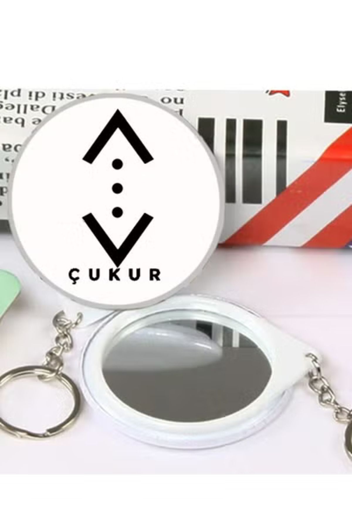 Generic-Circular keychain with the hole design of the series wonderful keychain with reflective mirror on th 1
