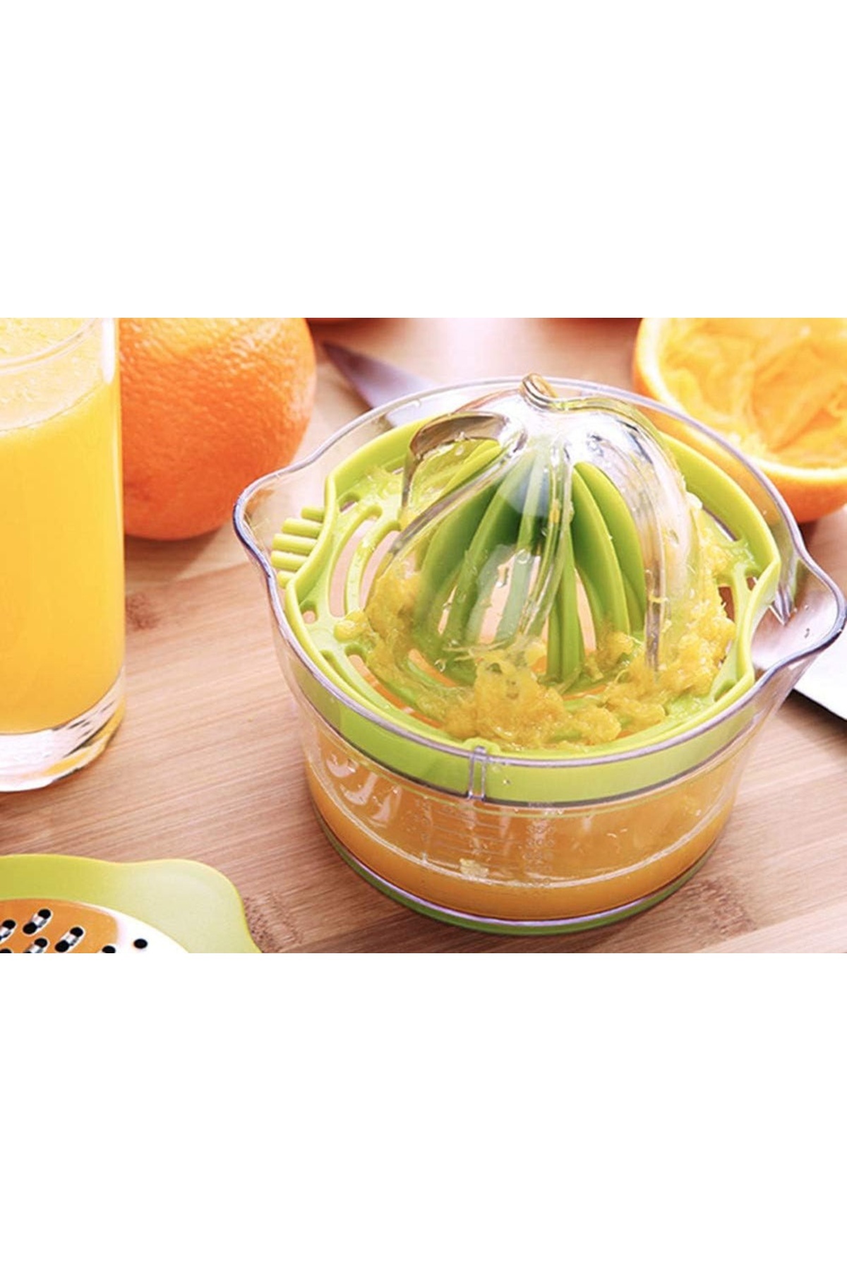 divendi-ro-Manual citrus juicer, plastic, transparent container with 400ml capacity and pit sieve, green 5