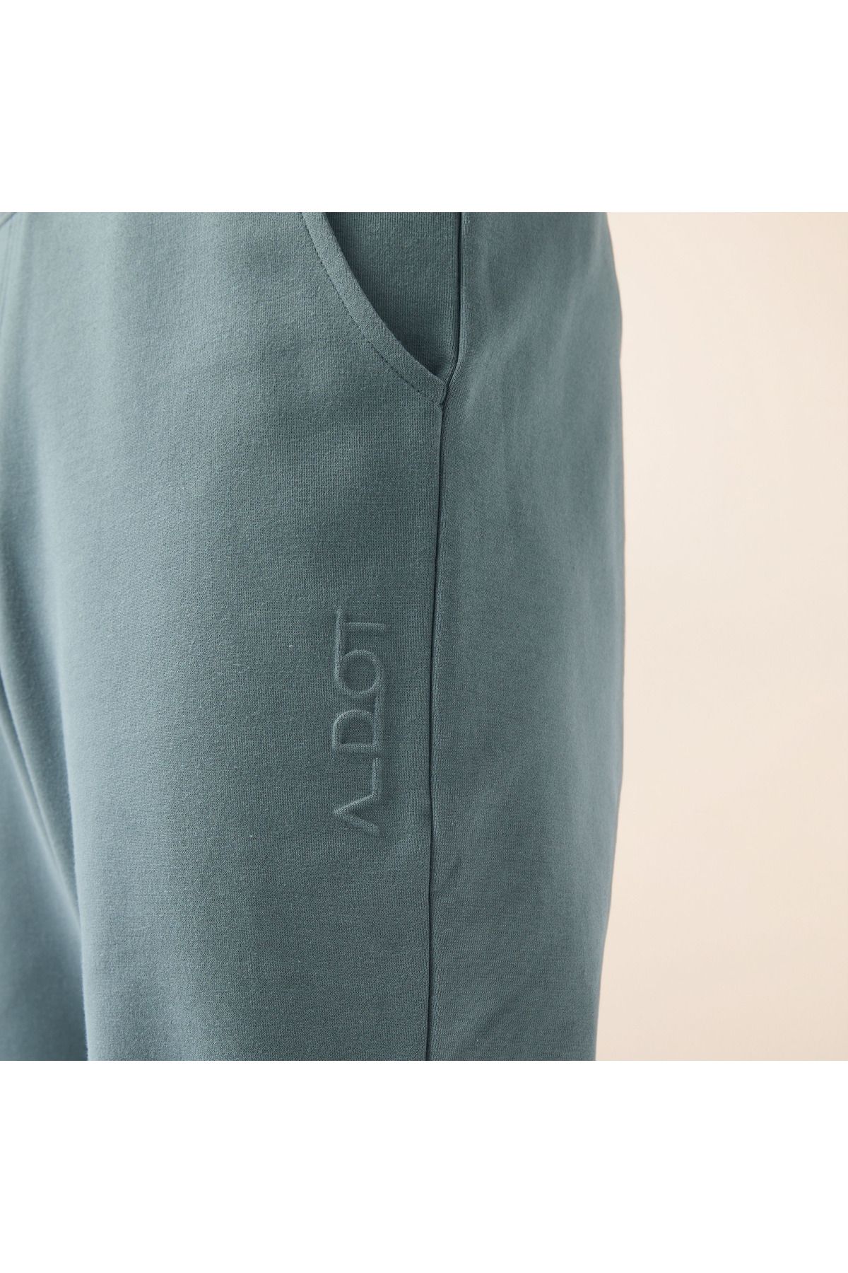 Adot-Embossed Logo Track Pants with Pockets 4