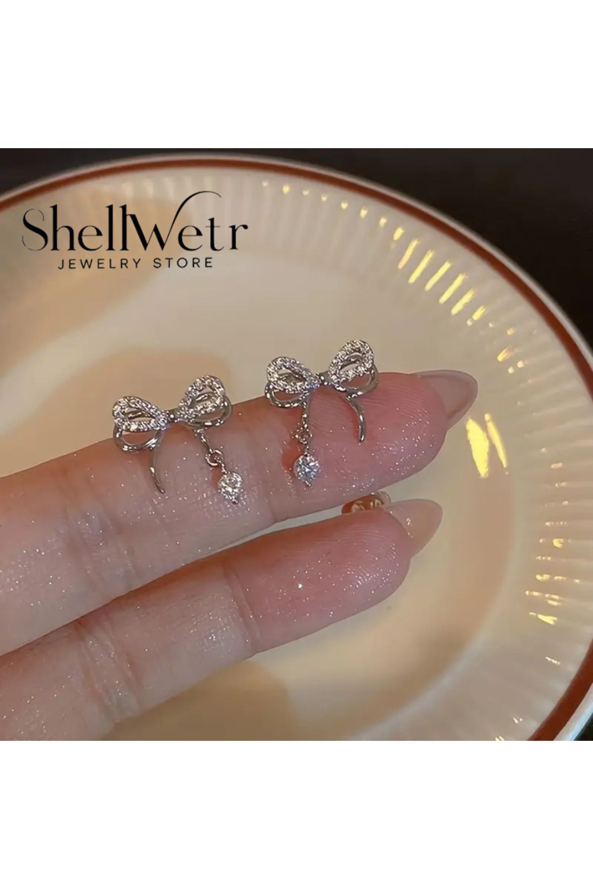 ilkadimbuklet-Bow Earrings Shell Wet 1