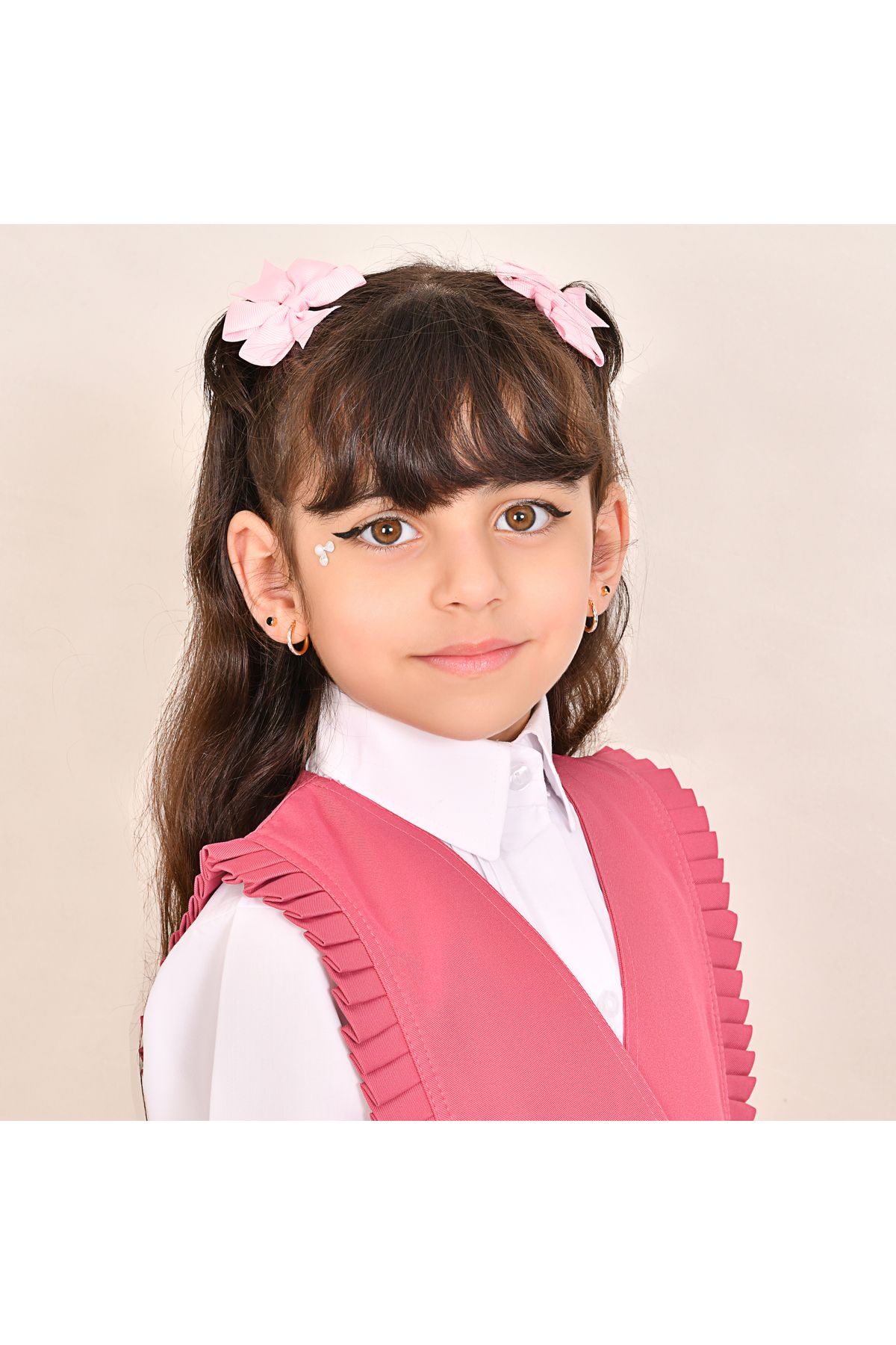 HAWRAA-مريول وردي بقصة مثلثه وكشكش ناعم وزم من الجانبين-ابتدائي 5