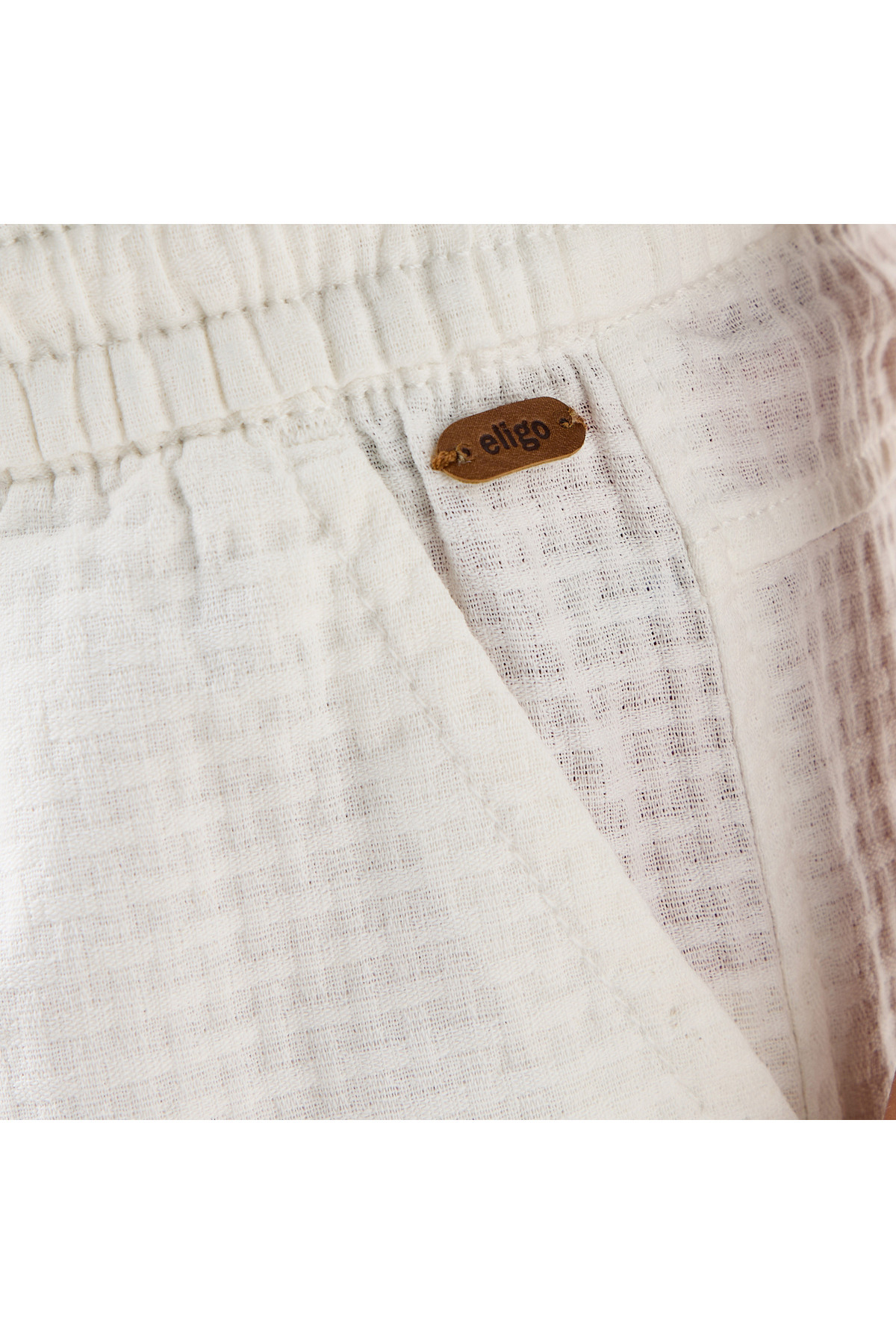 ELIGO-Textured Shorts with Drawstring Closure and Pockets 5