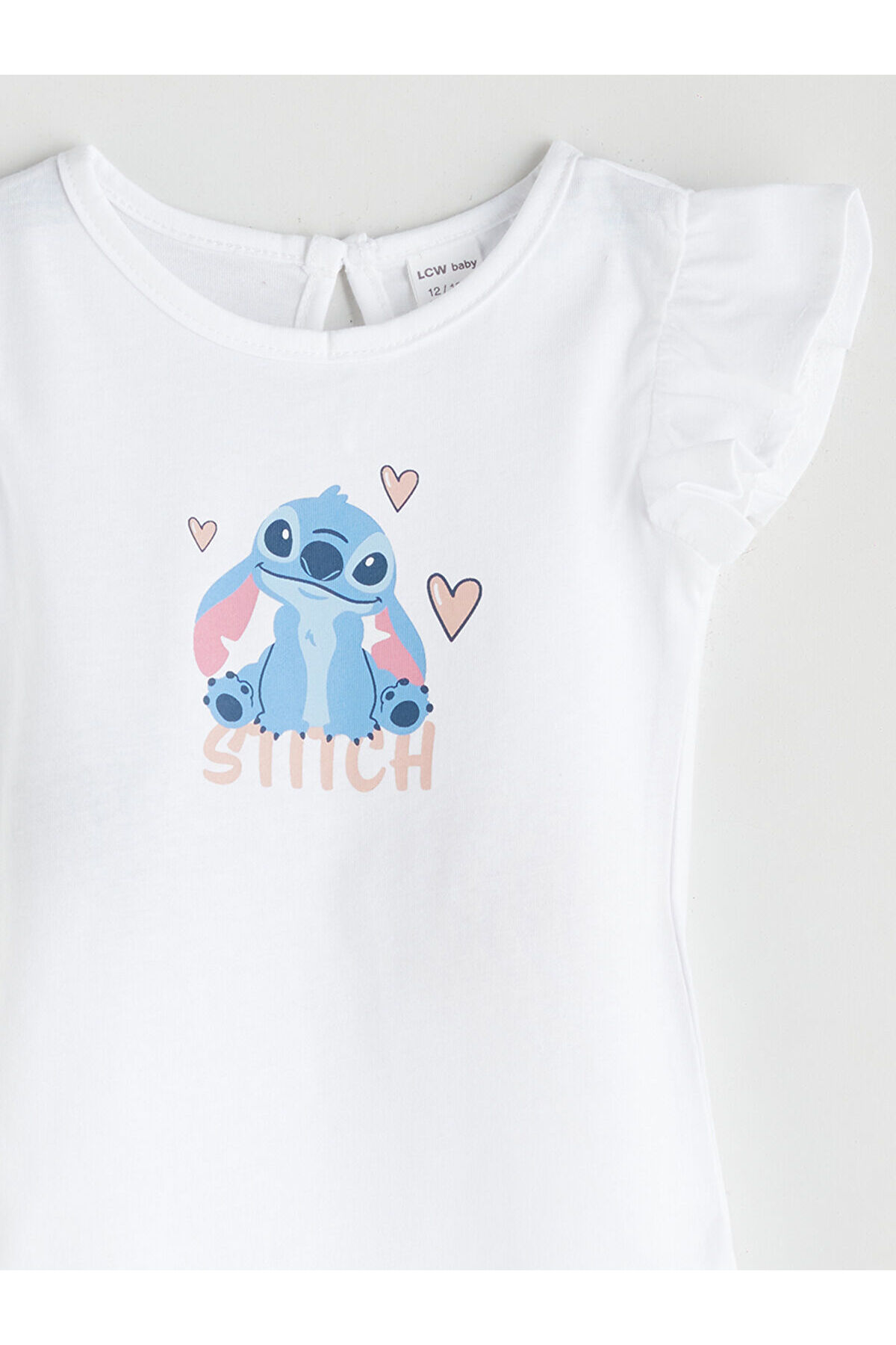 LC Waikiki Nevaa Collection Ekru Stitch Baskılı Kız Bebek Çıtçıtlı Body ve Şort 2'li fotoğrafı 6 (önizleme)