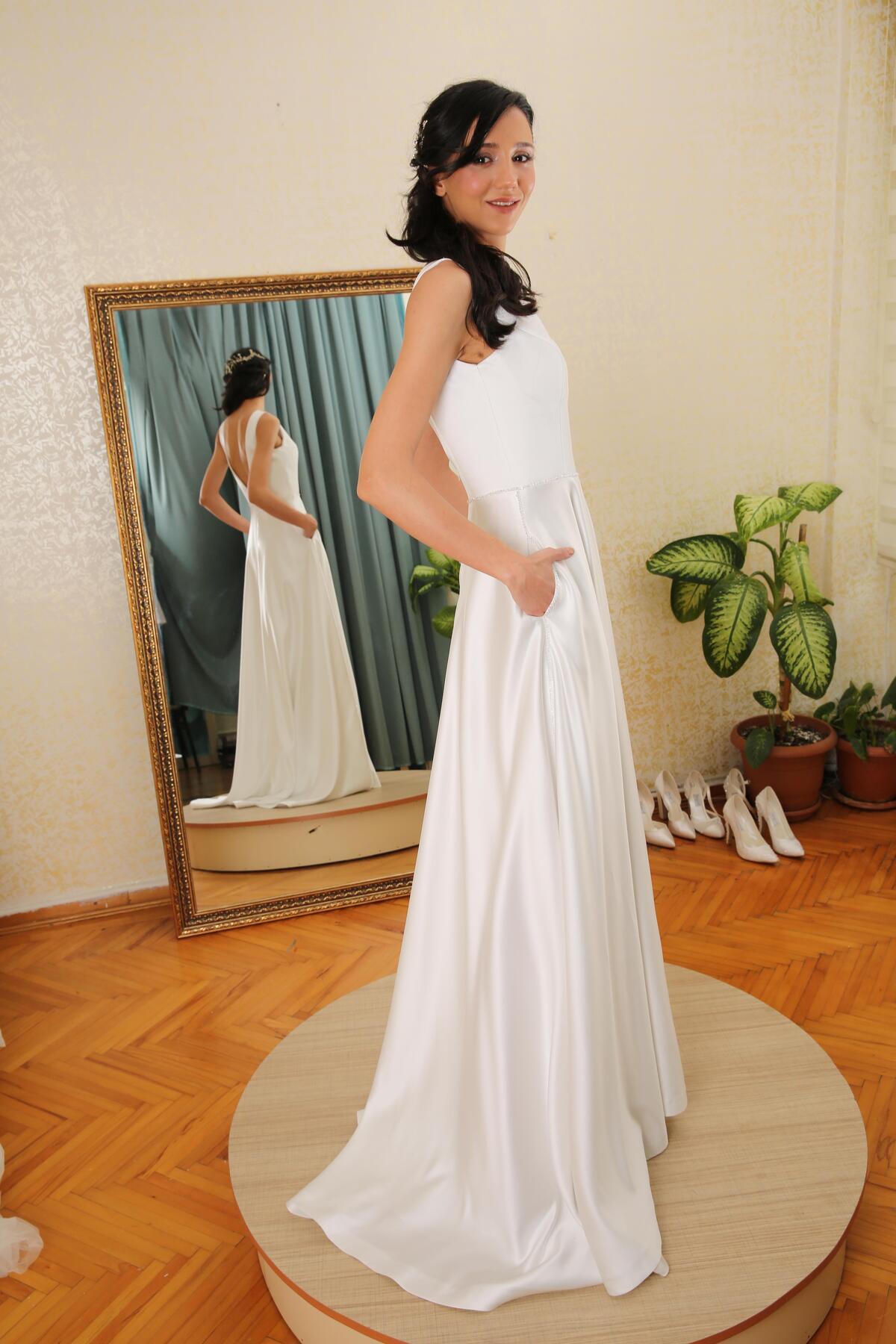 CRYSTAL EMBROIDERED A-CUT WEDDING DRESS WITH SATIN POCKETS