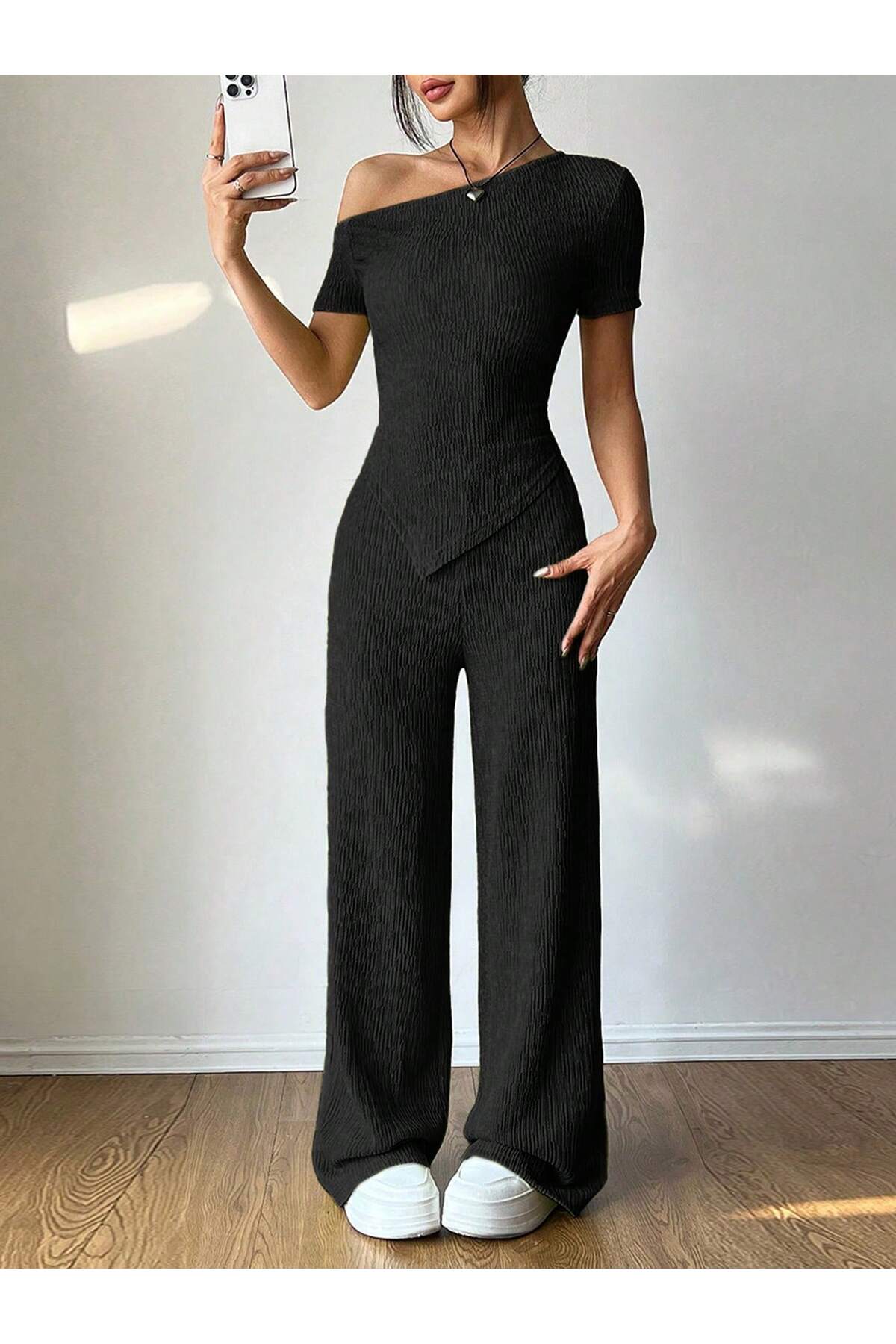 black low shoulder asymmetrical hem and trousers top and bottom