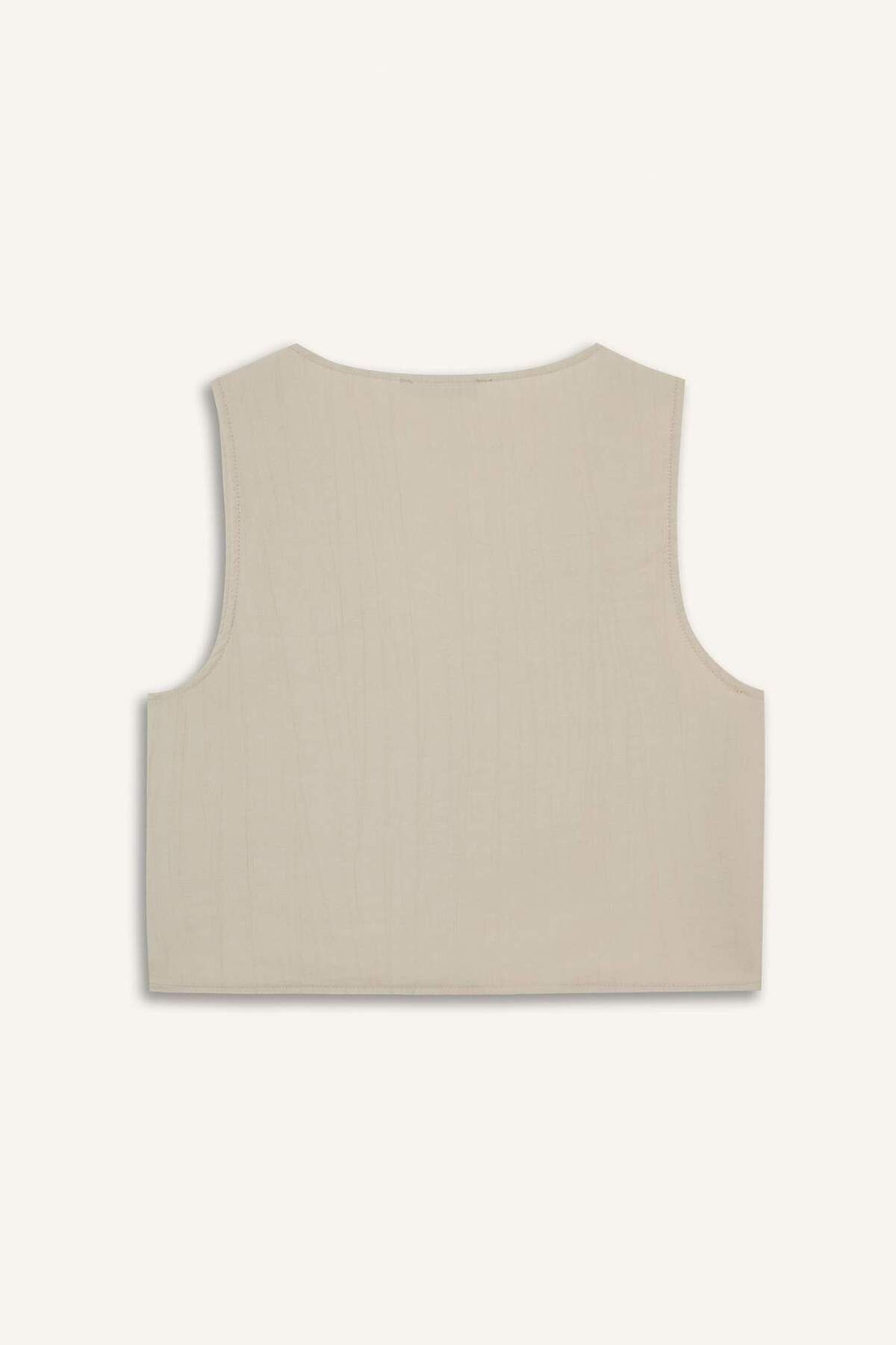 DeFacto-Ärmellose Bluse aus Crinkle-Stoff mit regulärer Passform und V-Ausschnitt zum Binden F0617AX25SM 3