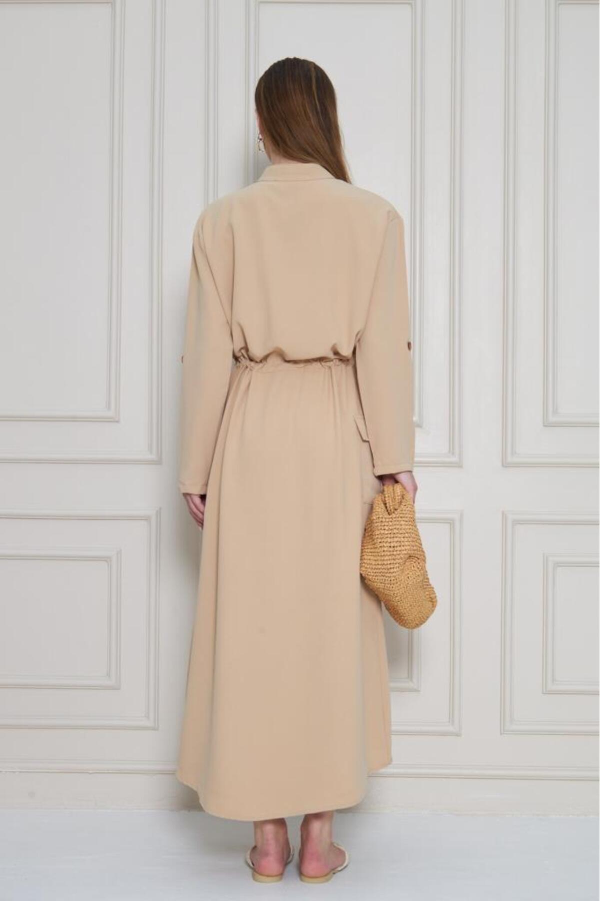 a beige dress