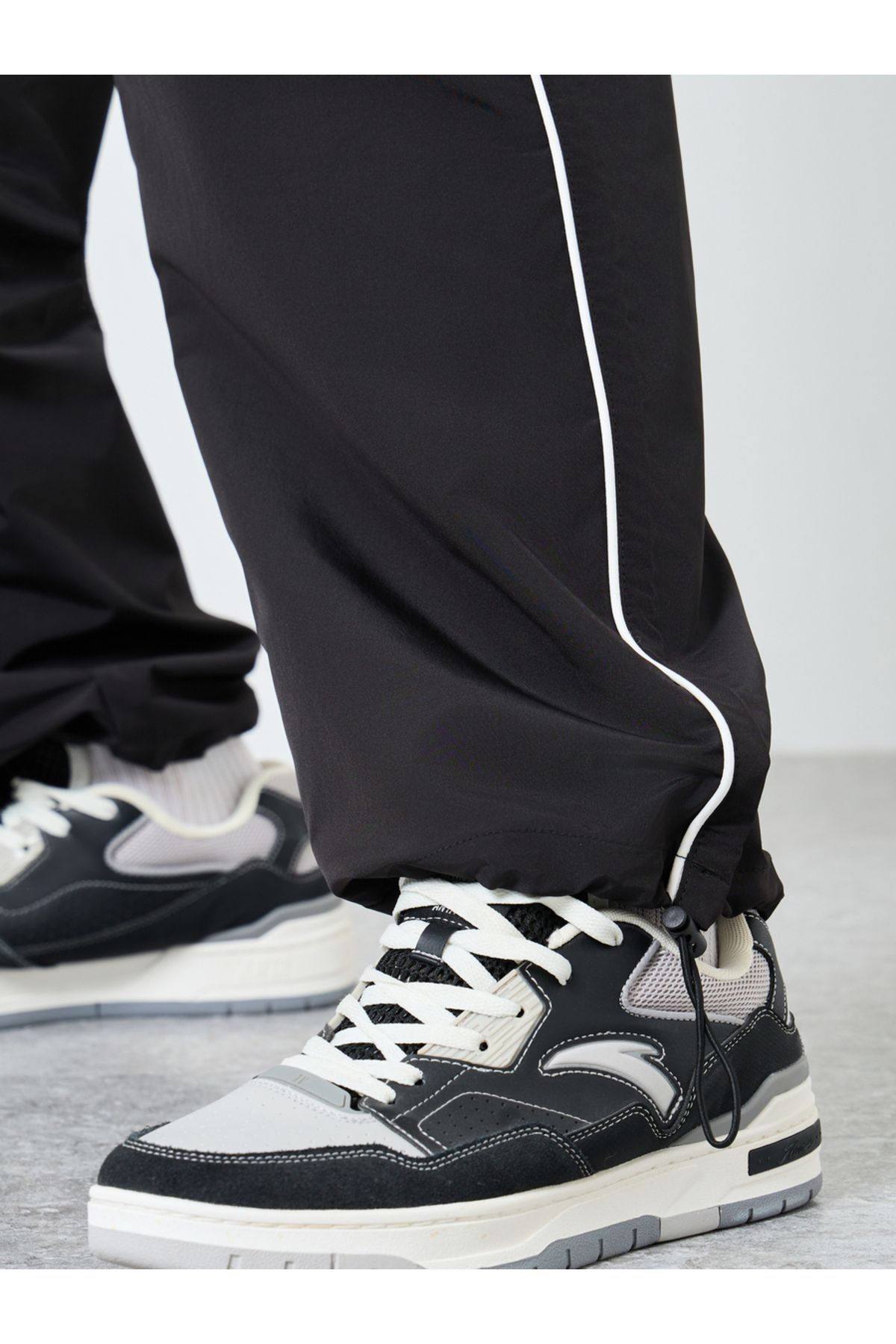 Styli-Black Relaxed Fit Joggers with Side Piping and Placement Print 4