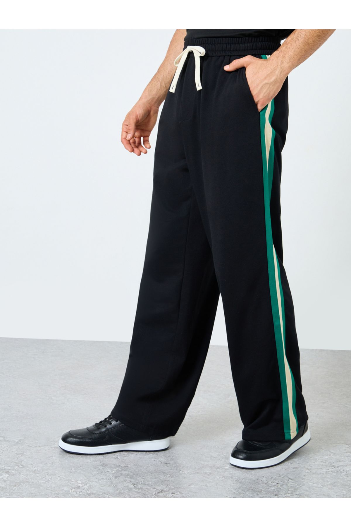 Styli-Relaxed Fit Open Hem Joggers with Side Tape and Badge Detail 3