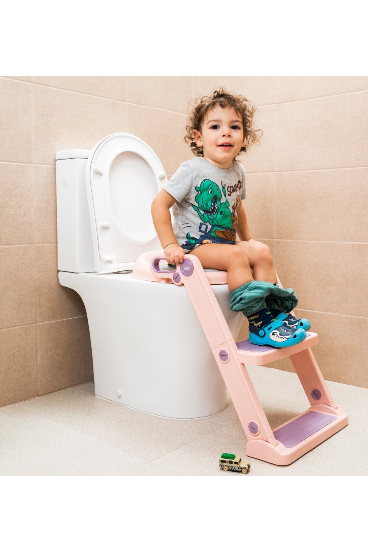 BabySnugg-Children's toilet reducer with foldable ladder and soft seat - with adjustable steps, oval toilet (40-47cm) 1