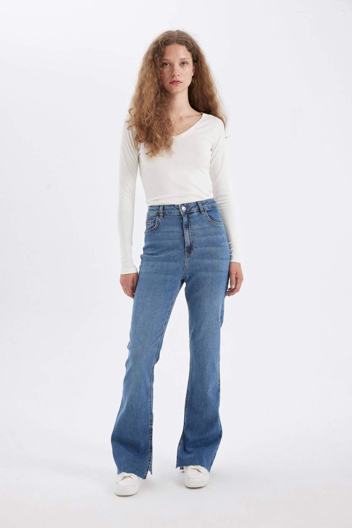 Slim Flare Normal Bel Yırtmaçlı Uzun Jean Yıkamalı Pantolon C7621AX24AU