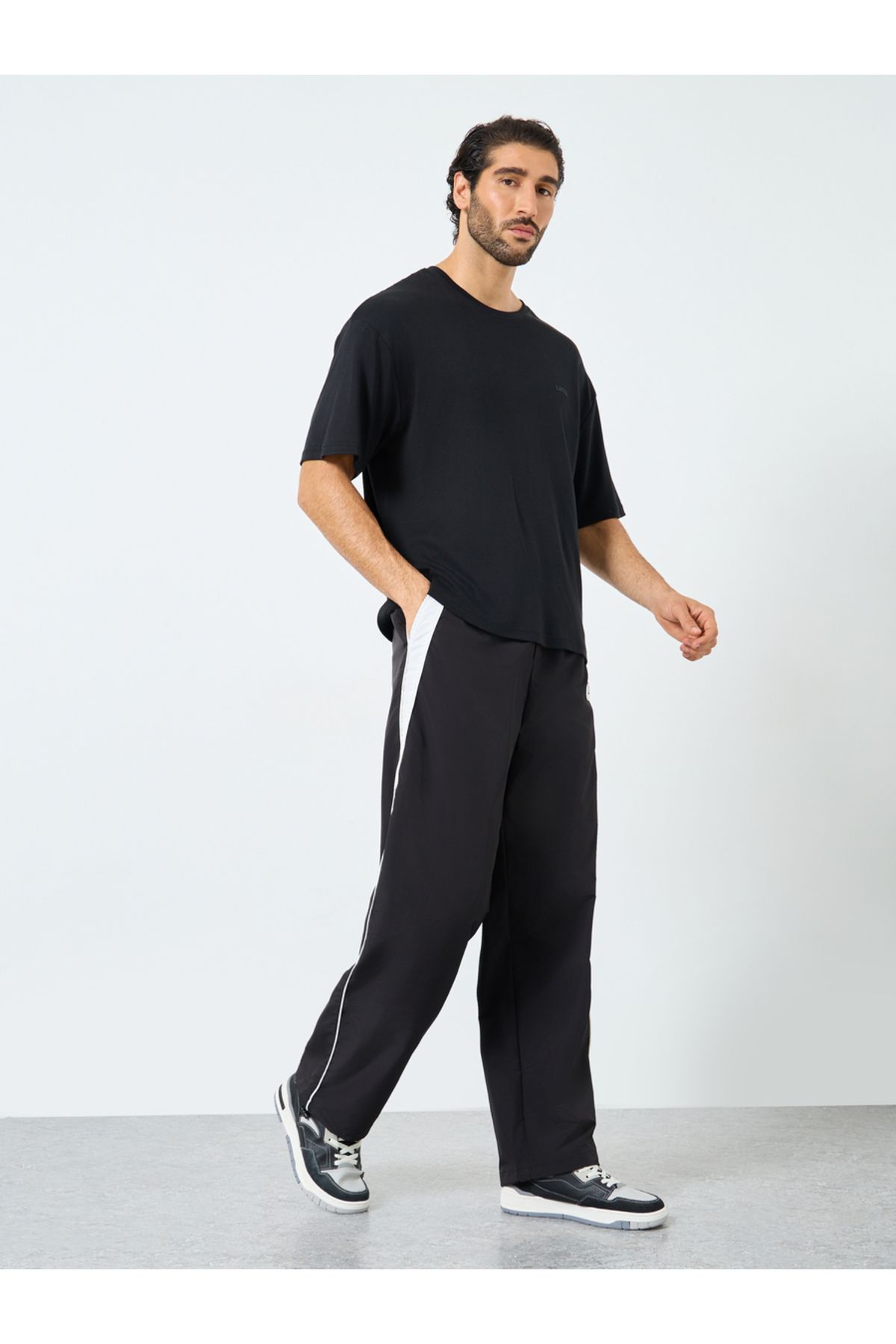 Styli-Black Relaxed Fit Joggers with Side Piping and Placement Print 2