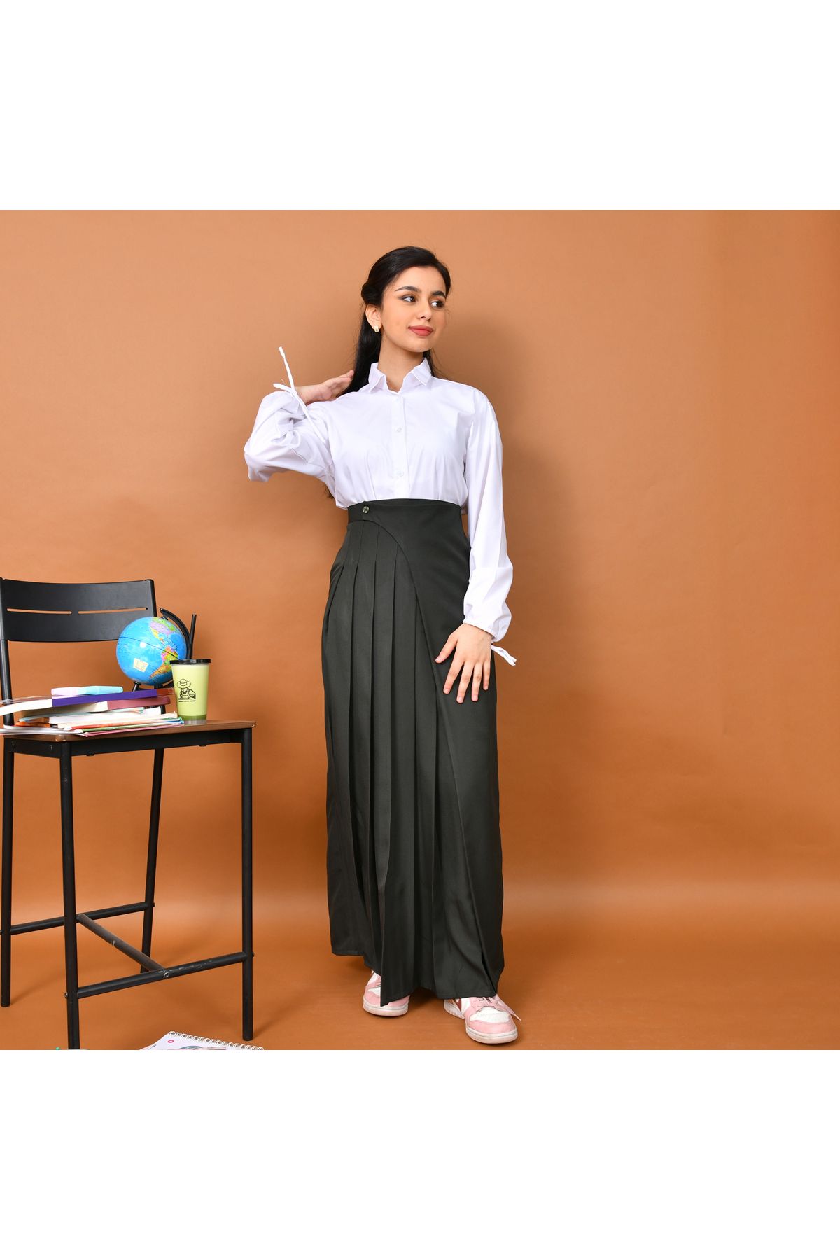 HAWRAA-A distinctively designed skirt with wide pleats and a side cut decorated with a button and hidden pockets (olive) 1