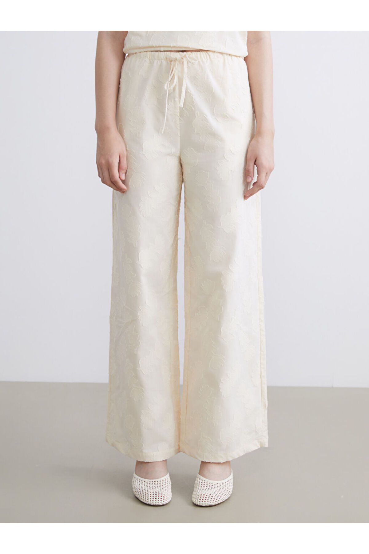 LC Waikiki-Sparkling Selections from Shining Store |   Ecru Elastic Waist Self Patterned Women's Trousers 6