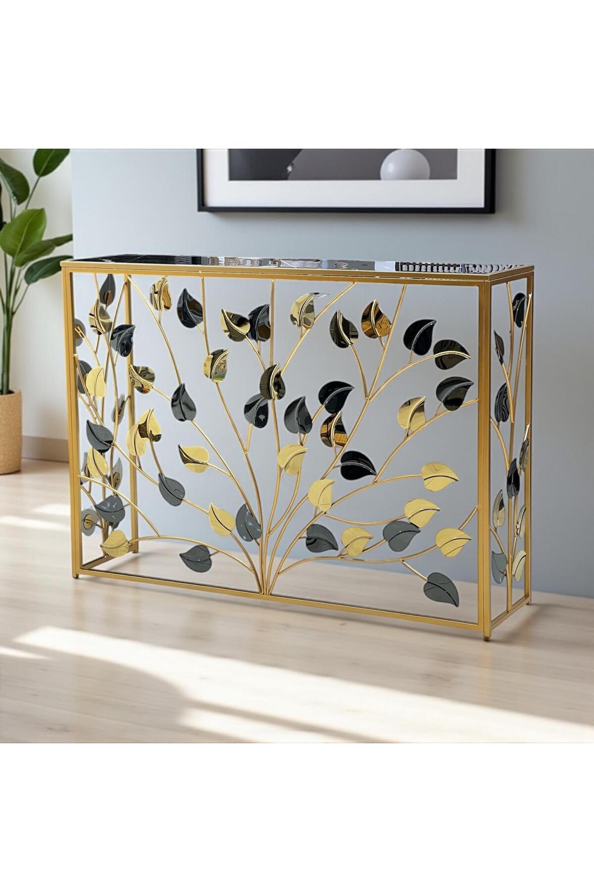 Gharaib Al Tuhaf-Luxury entry table with gold frame and double leaf pattern - elegant design and artistic touch 1