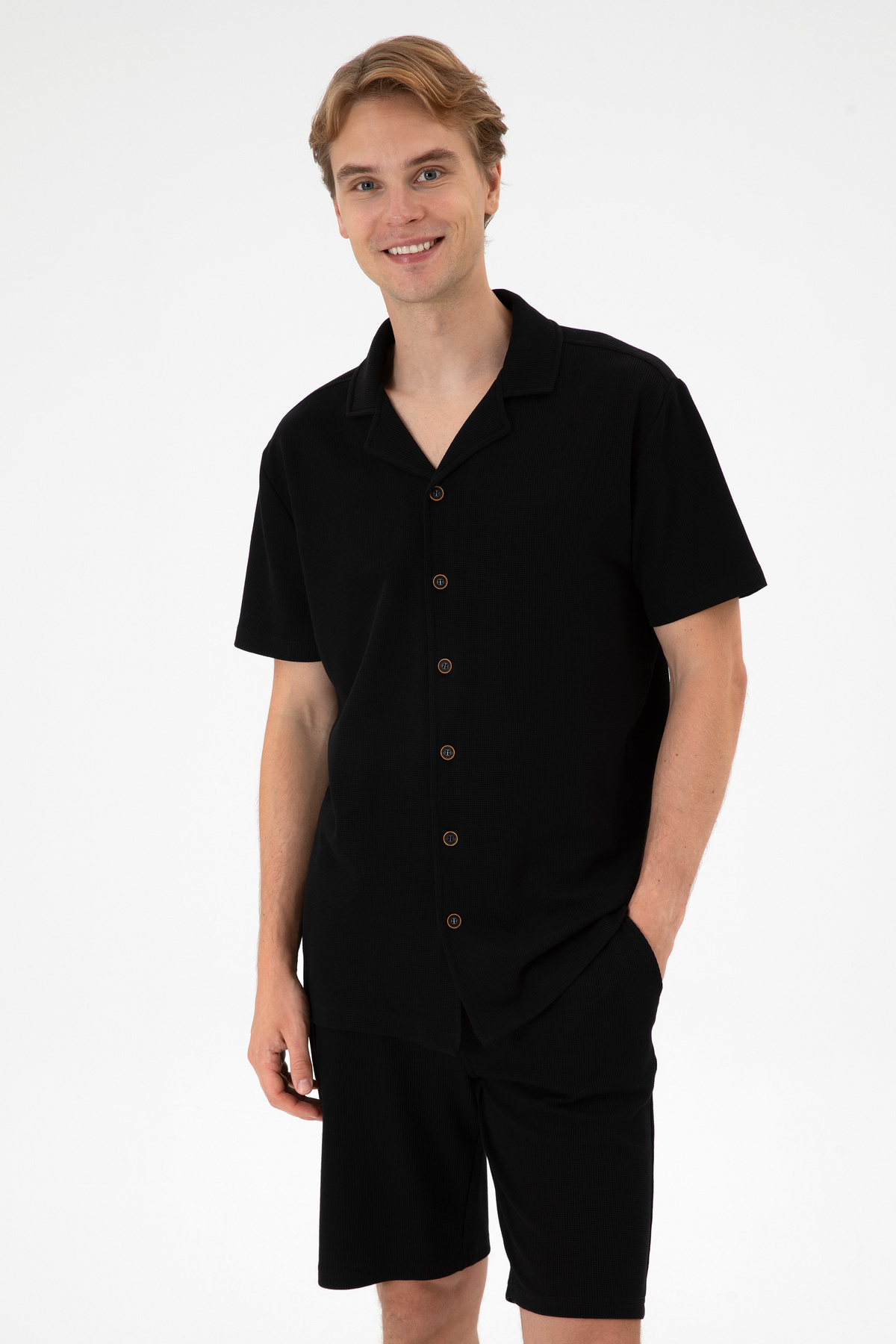 پیراهن بافتنی آستین کوتاه مردانه یقه آپاچی مشکی برند یو اس پولو کد:(50306977-VR046) U.S. Polo Assn.