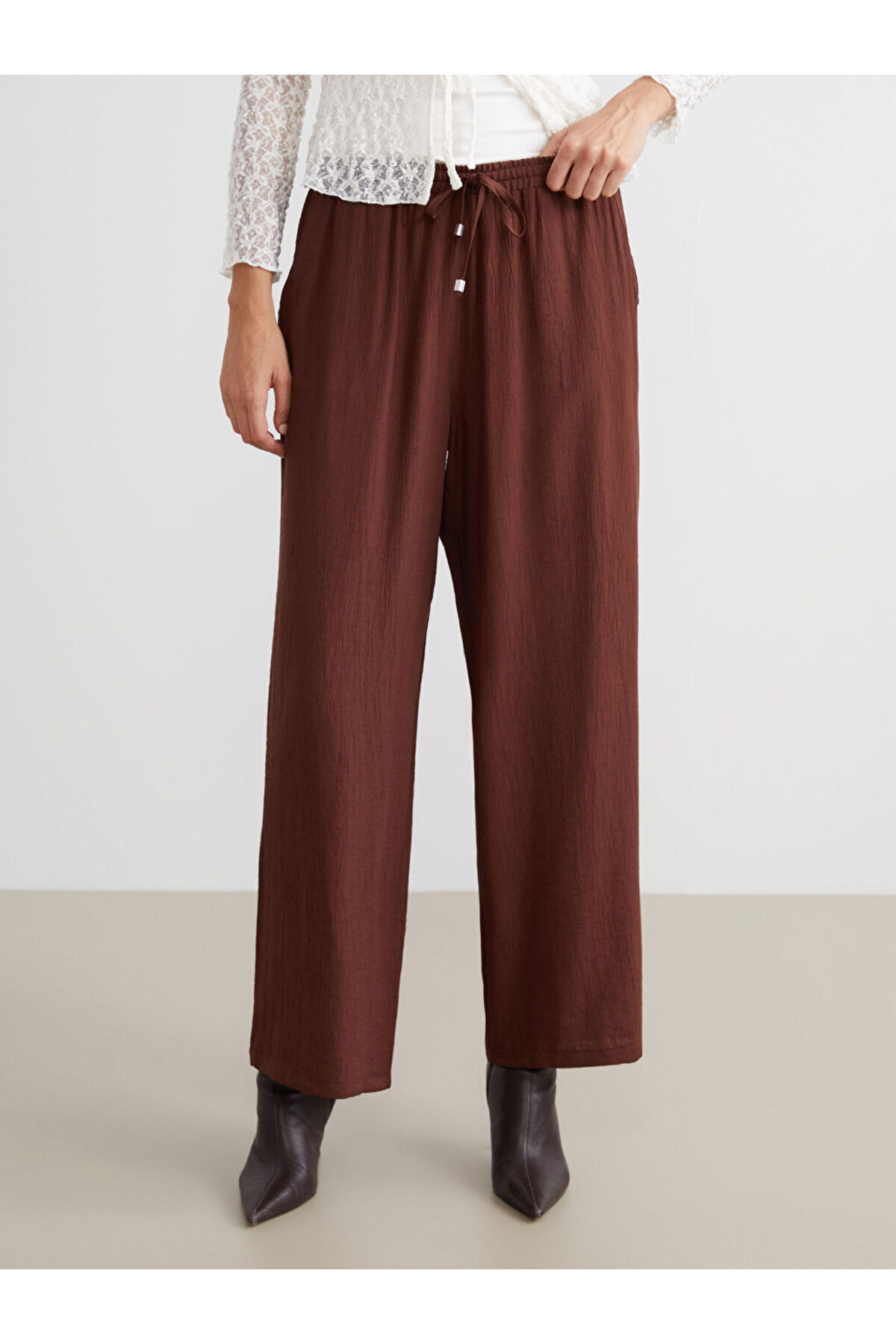 LC Waikiki-Create Your Style from Uzg Store |   Textured Women's Trousers with Elastic Waist 3