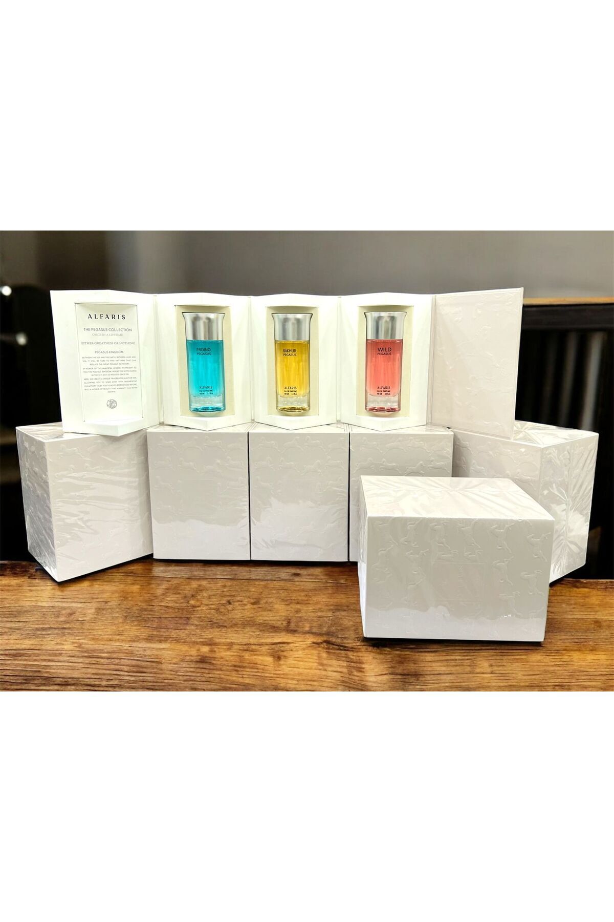 Re-"ALFARIS THE DICSALIS COLLECTION" perfume set with three perfume bottles in an elegant white box decorated with... 2