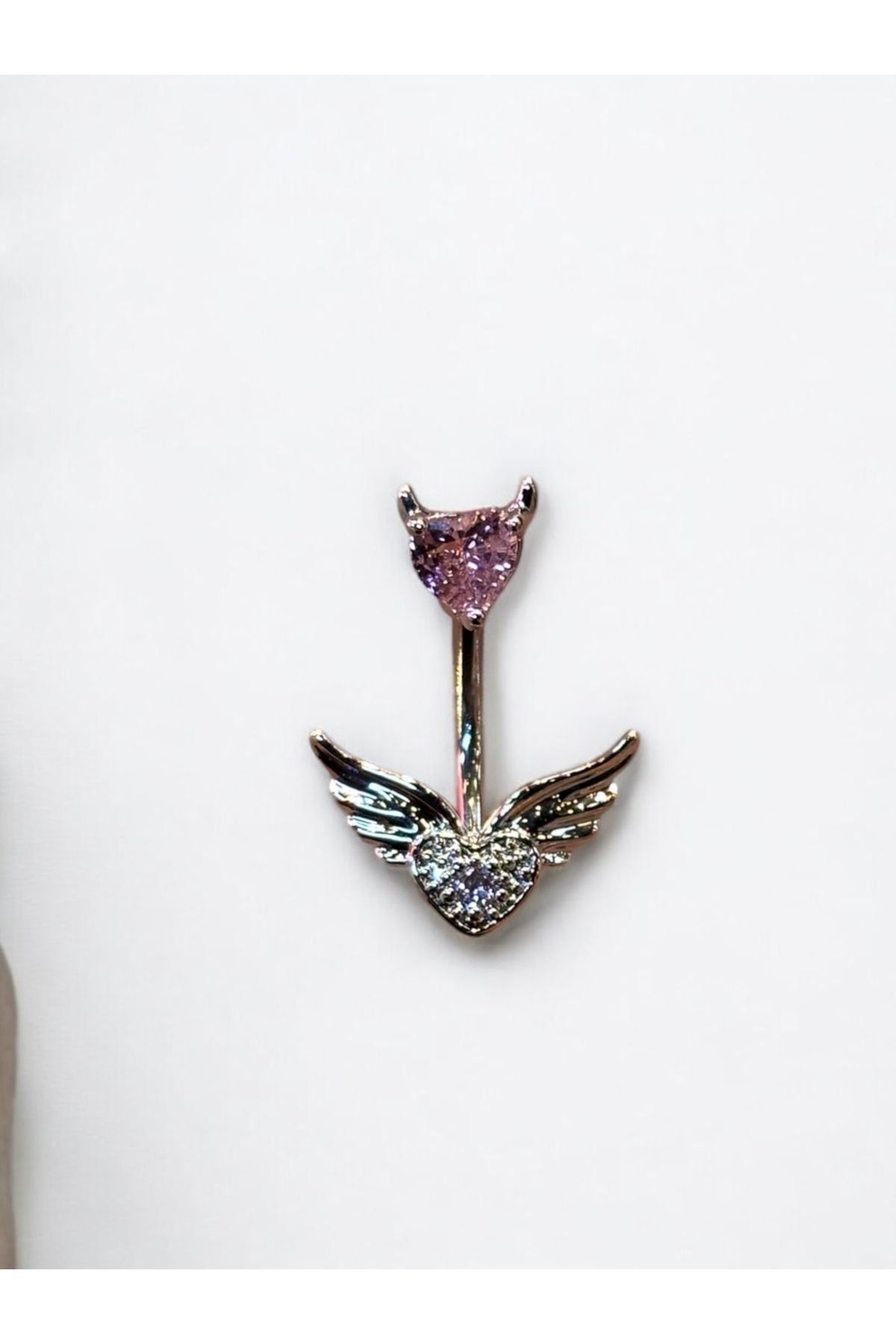 Takayrum-Belly Piercing with Steel Heart and Wing Detail 4