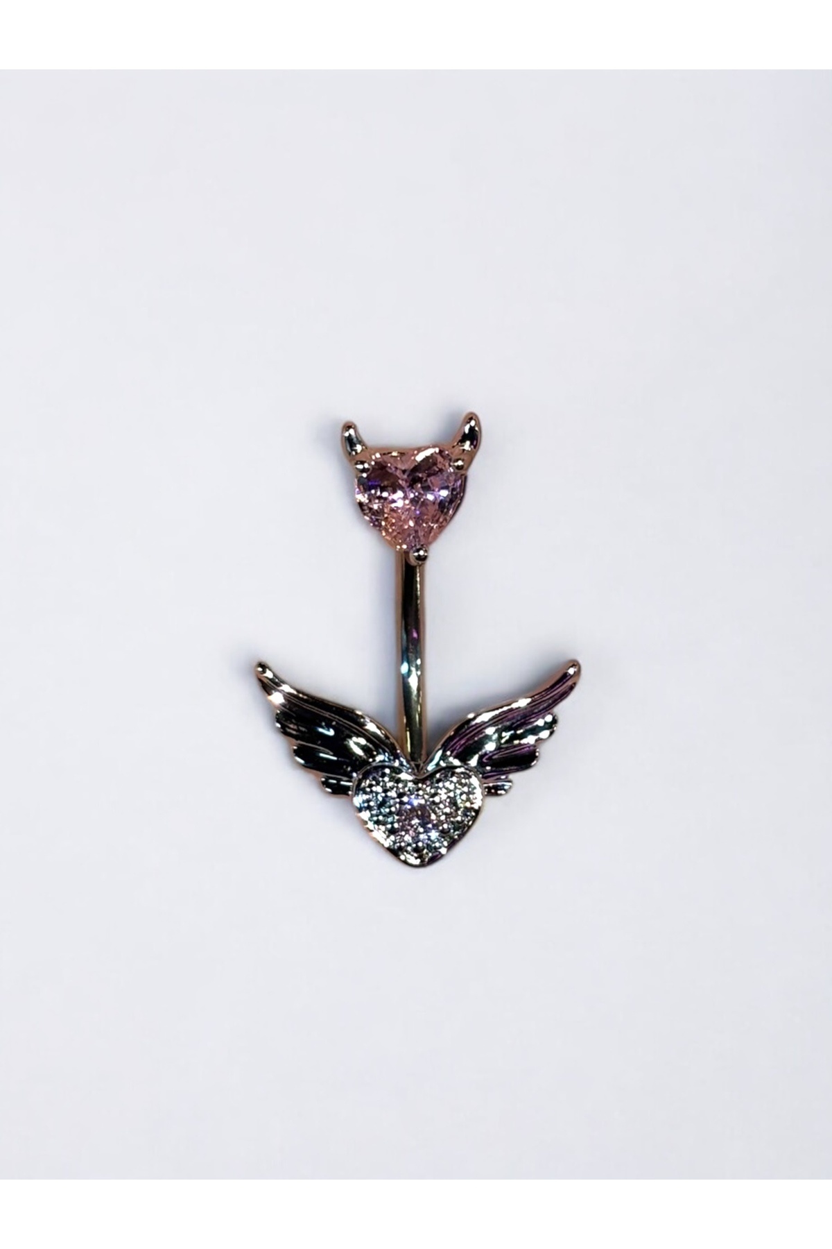 Takayrum-Belly Piercing with Steel Heart and Wing Detail 2