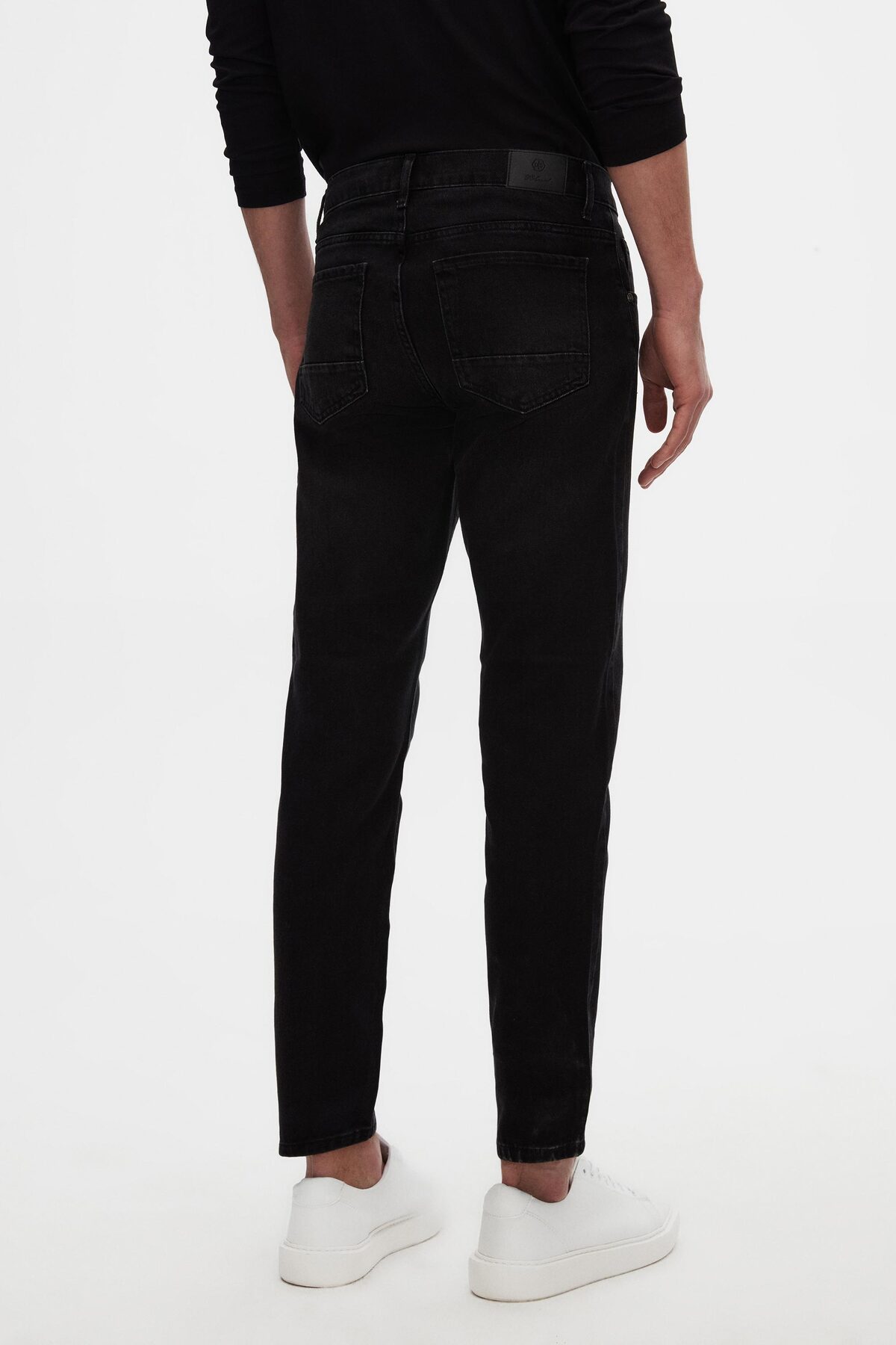 شلوار جین مردانه Ds Damat مدل Comfort Fit رنگ مشکی ساده پنج جیب یقه دار