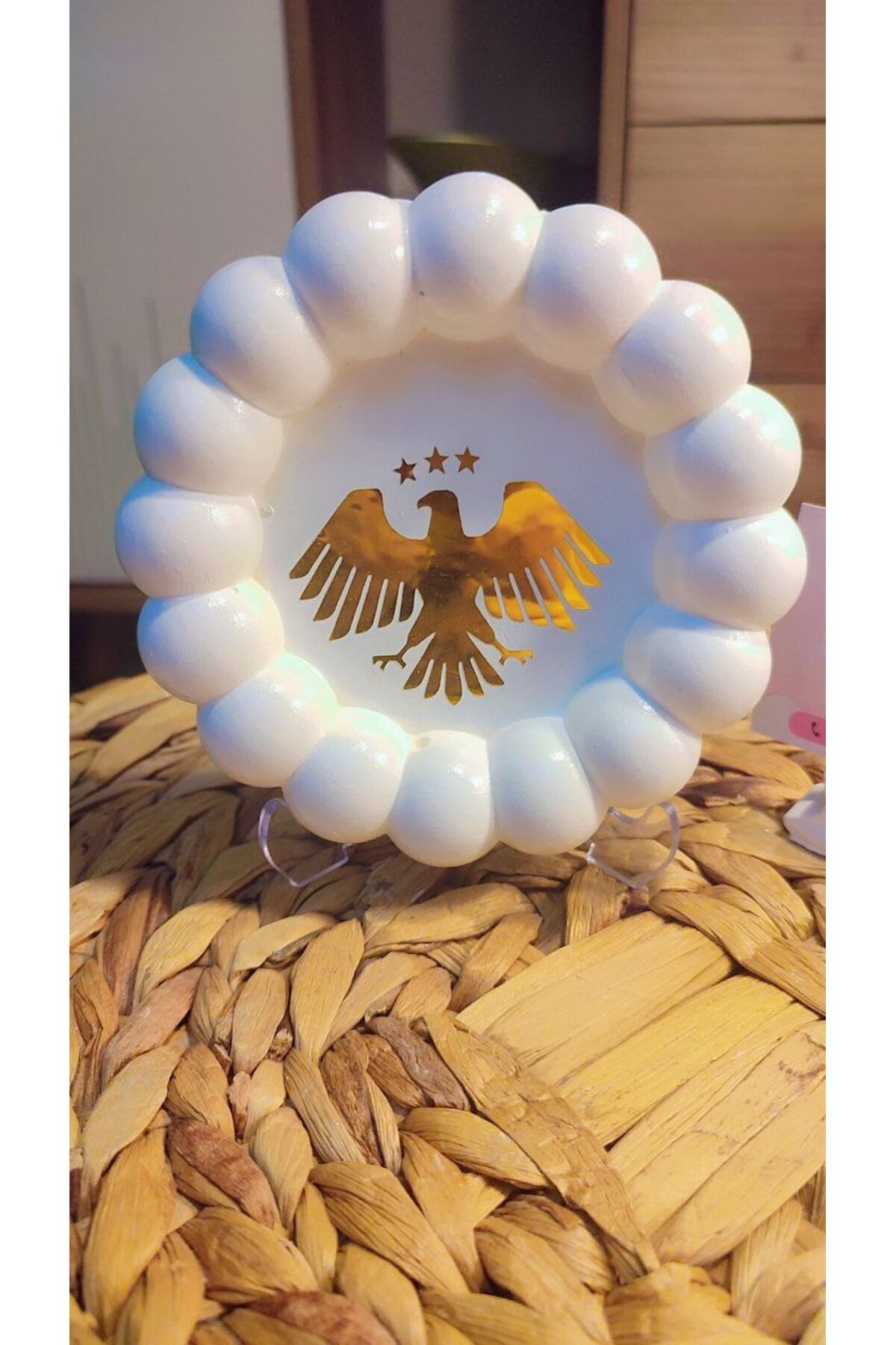 shamatolyesi-Eagle with Its Wings Spread in the Middle of the Frame and Three Stars Above It 1