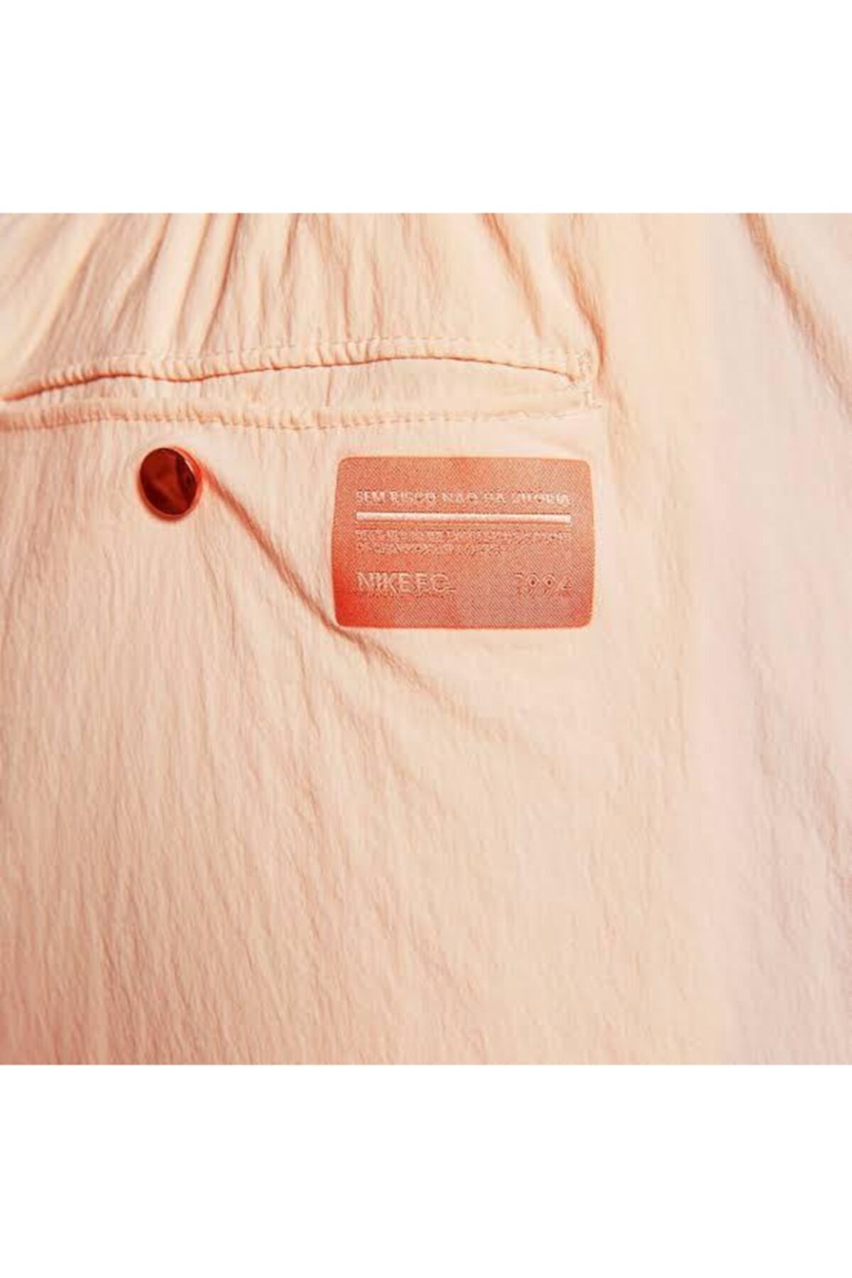 Nike peach tracksuit sale