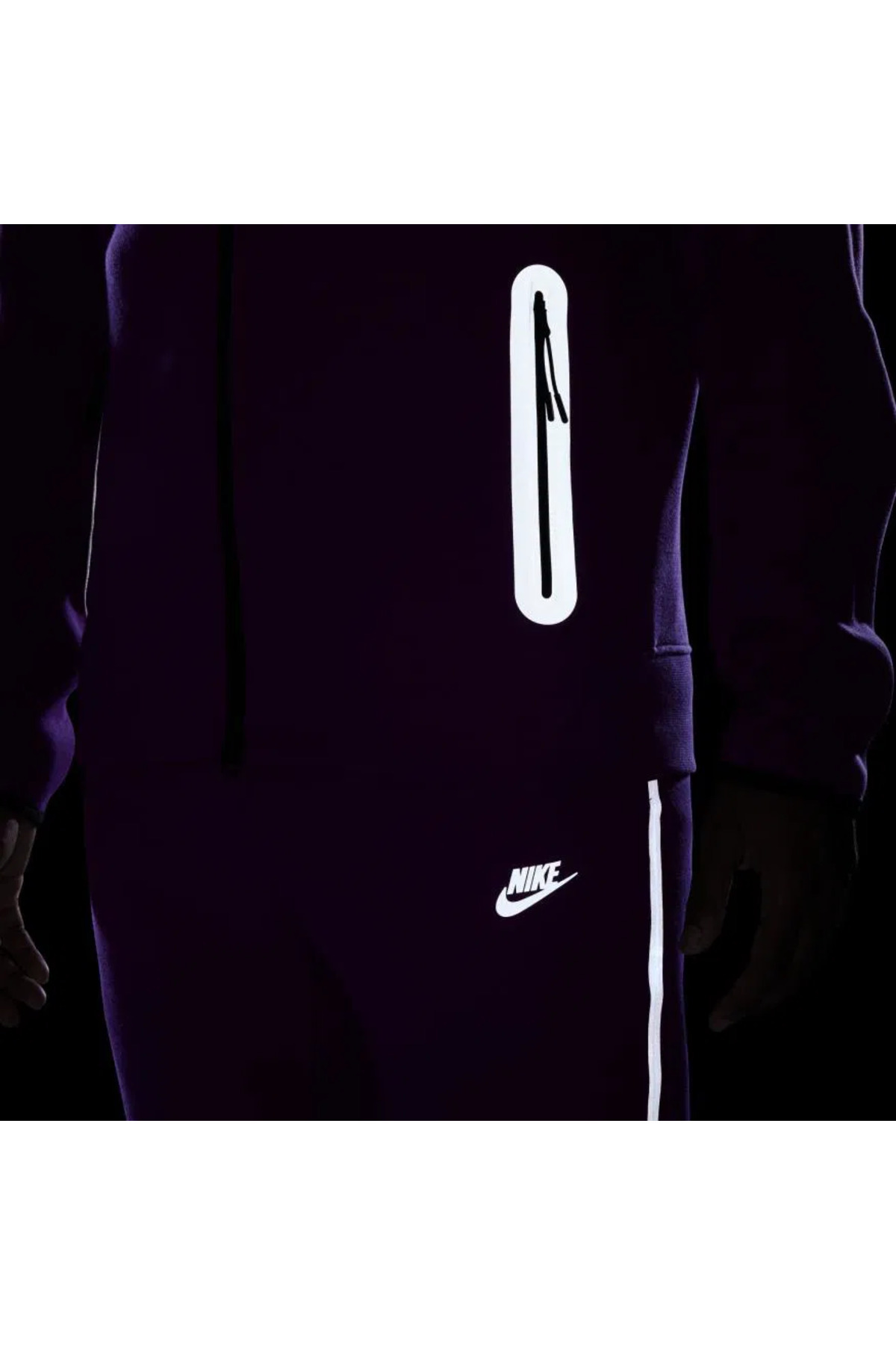 purple and black nike tech