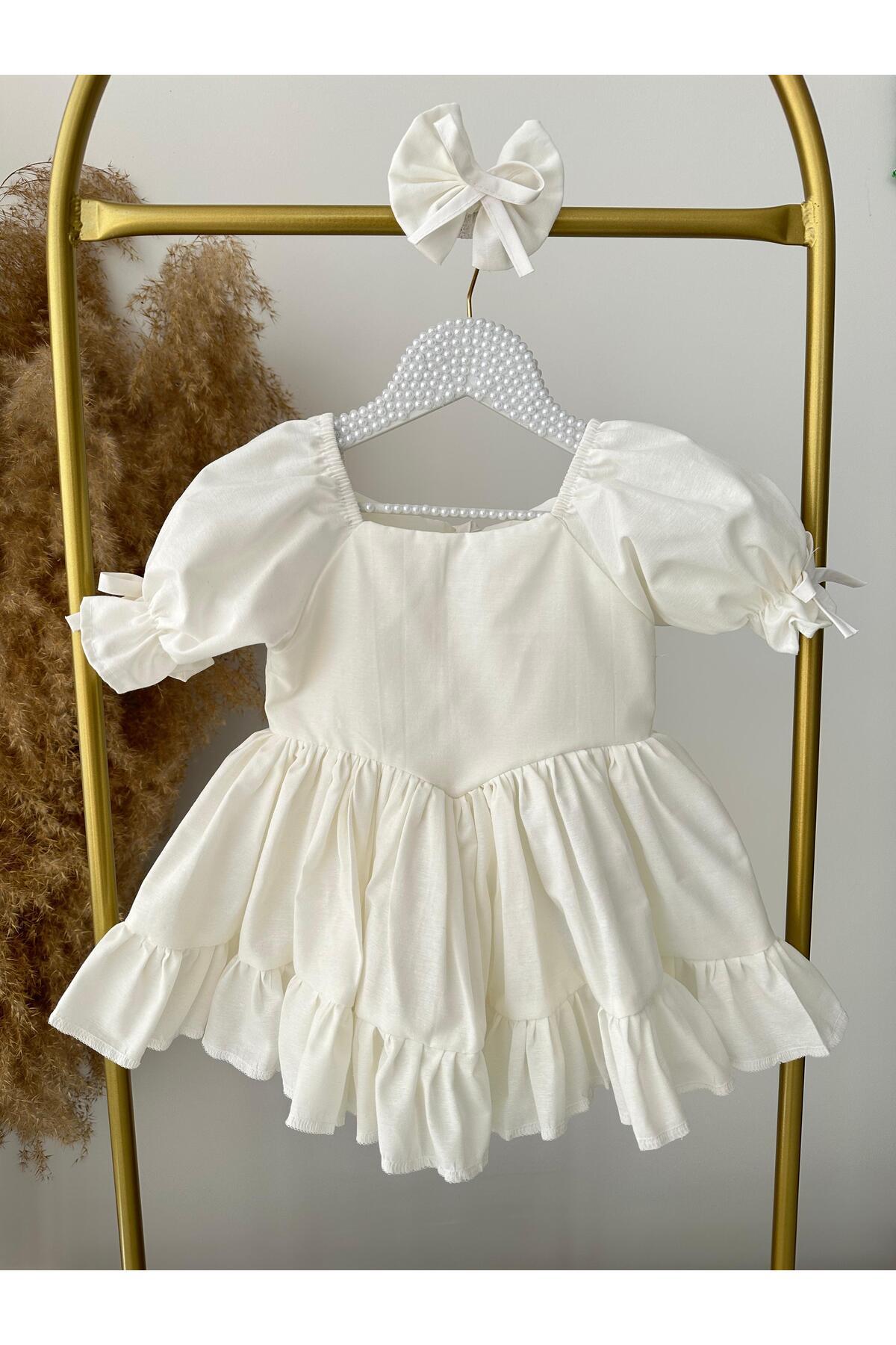 Hobidik Kız Bebek ve Çocuk Kırık Beyaz Elbise | Fırfırlı Pamuklu Sırtı Fiyonklu fotoğrafı 5 (önizleme)