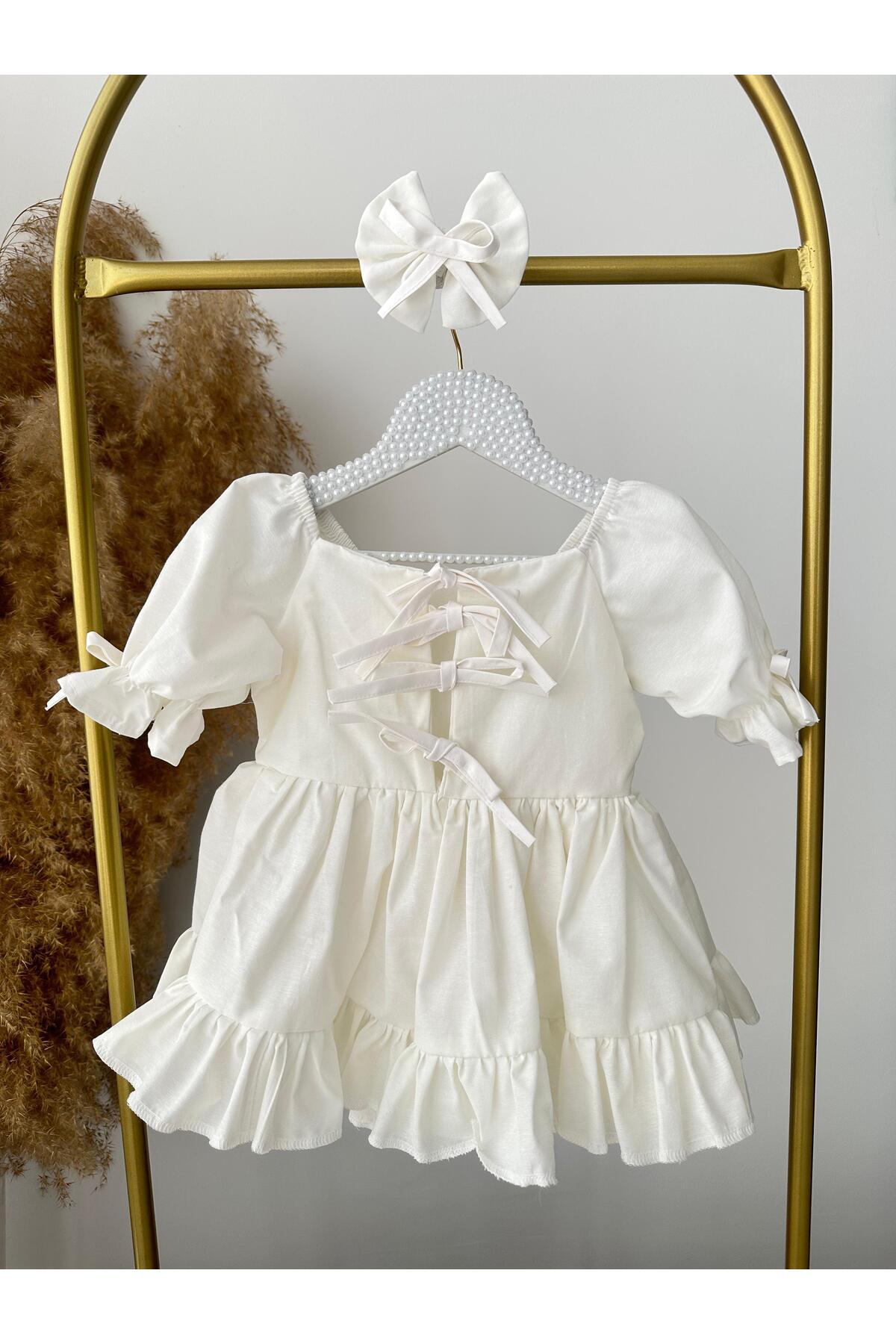Hobidik Kız Bebek ve Çocuk Kırık Beyaz Elbise | Fırfırlı Pamuklu Sırtı Fiyonklu fotoğrafı 7 (önizleme)