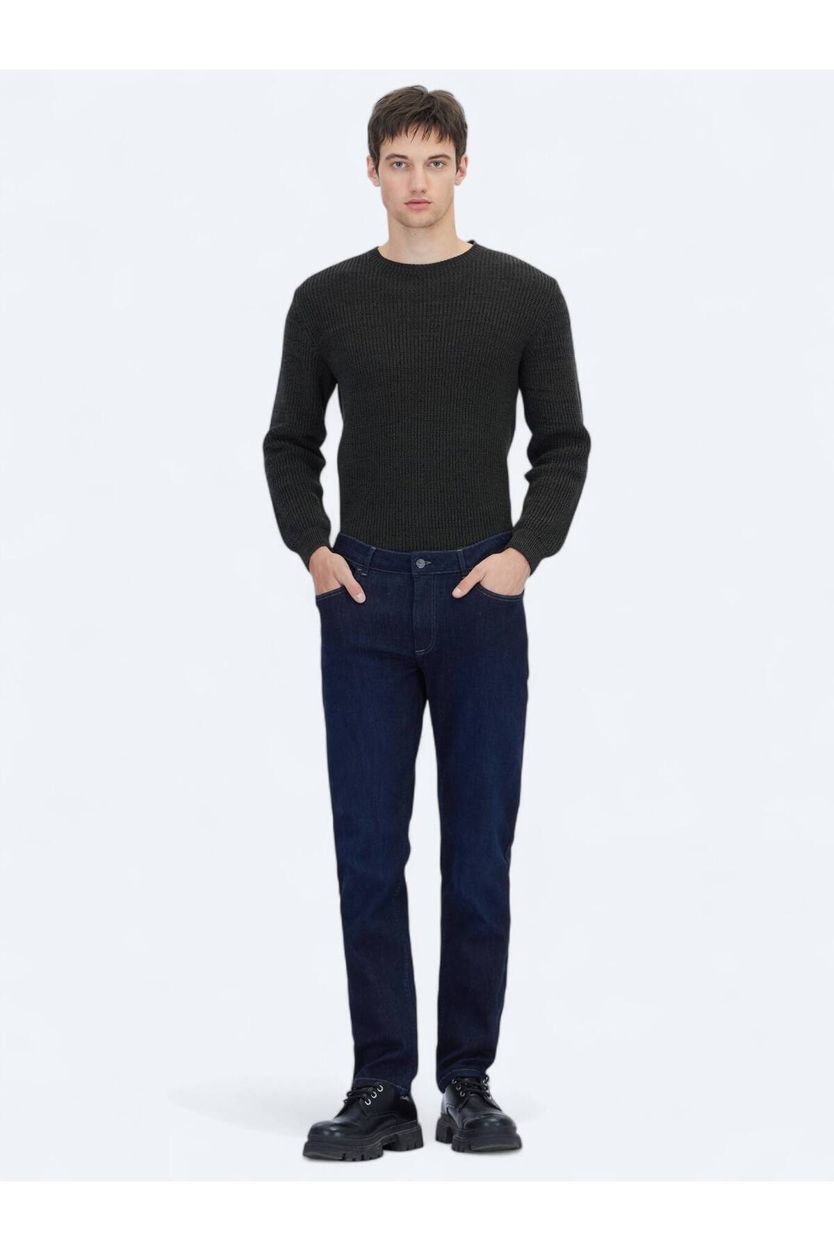 شلوار جین ساده و اسلیم فیت سرمه‌ای طرح ترکیبی پنبه و جین Kip