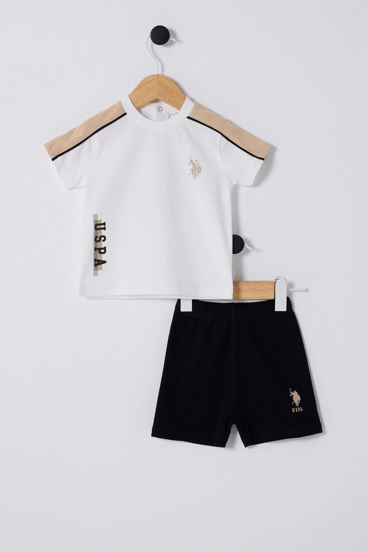 یو اس پولو لباس نوزادی کرم رنگ پسرانه یو اس پولو لباس نوزادی کرم رنگ پسرانه