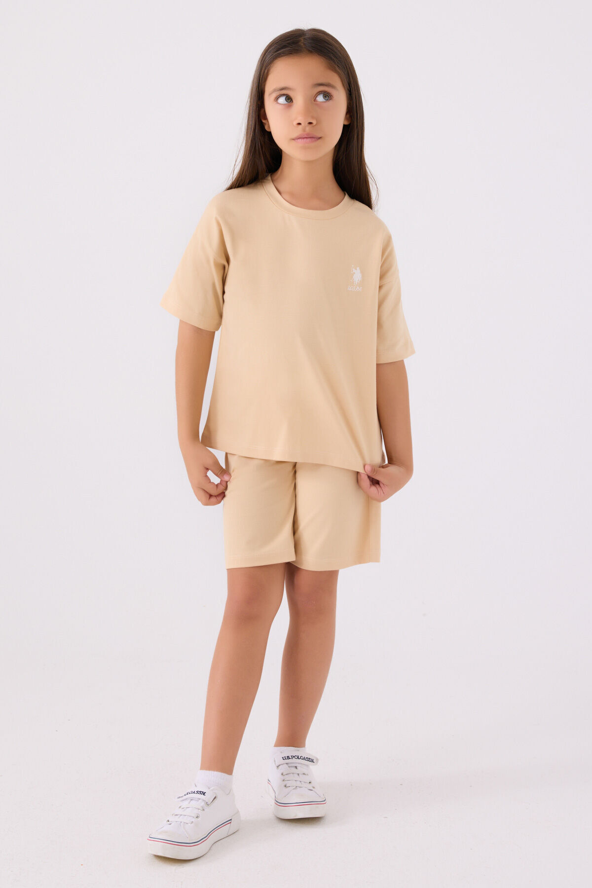 یو اس پولو ست برمودای دخترانه کرم رنگ یو اس پولو ست برمودای دخترانه کرم رنگ