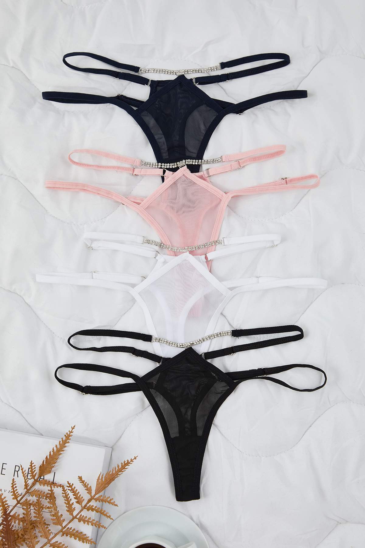 Trendyol Collection Mehrfarbiges 4er-Pack Tanga-Strickhöschen mit Tüll-Accessoire-Detail THMAW26KU00045