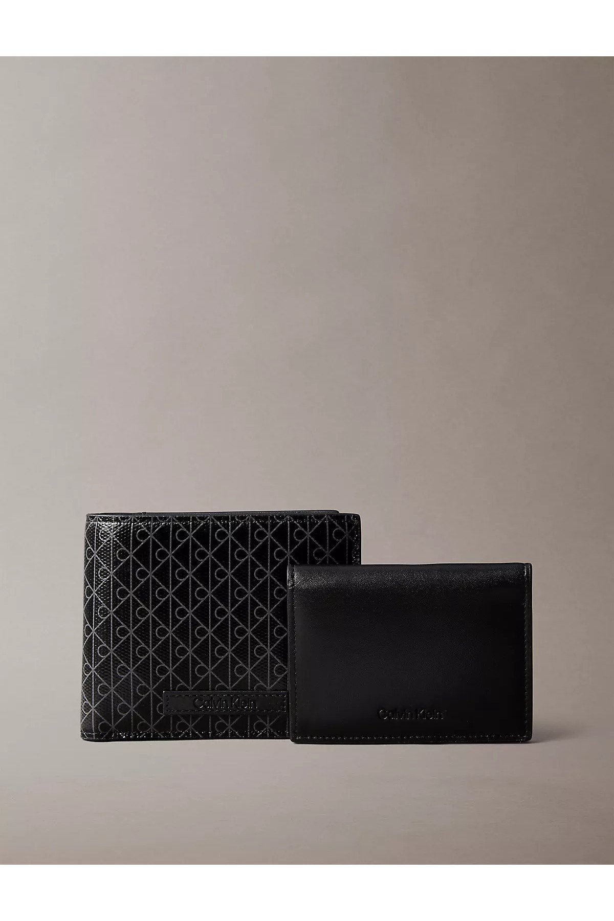 کلوین کلاین کیف پول مردانه طرح‌دار چرمی مشکی CK با جای کارت LV04D1086G-UB1