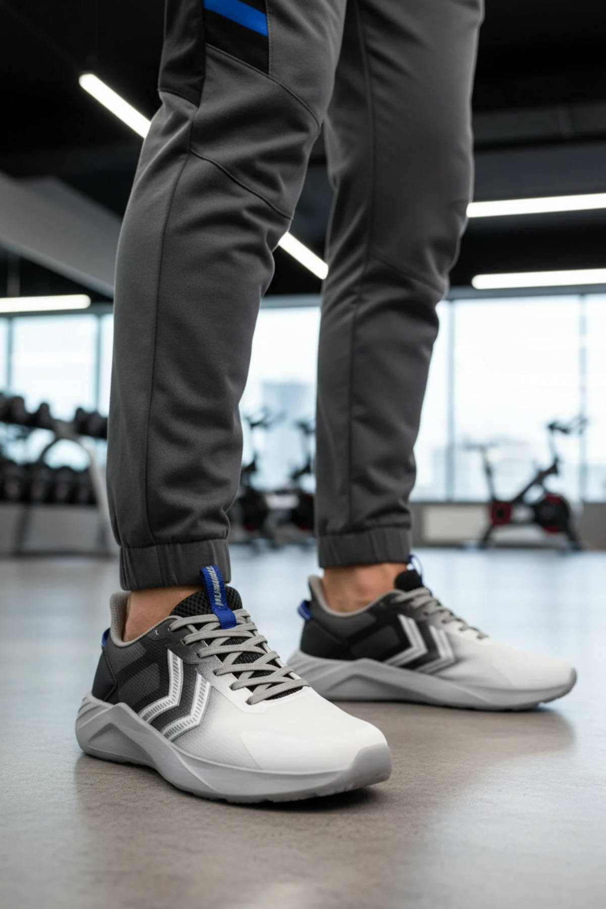 کفش ورزشی یونیسکس سفید-مشکی-خاکستری خورشیدی هامل کفش اسنیکر hummel