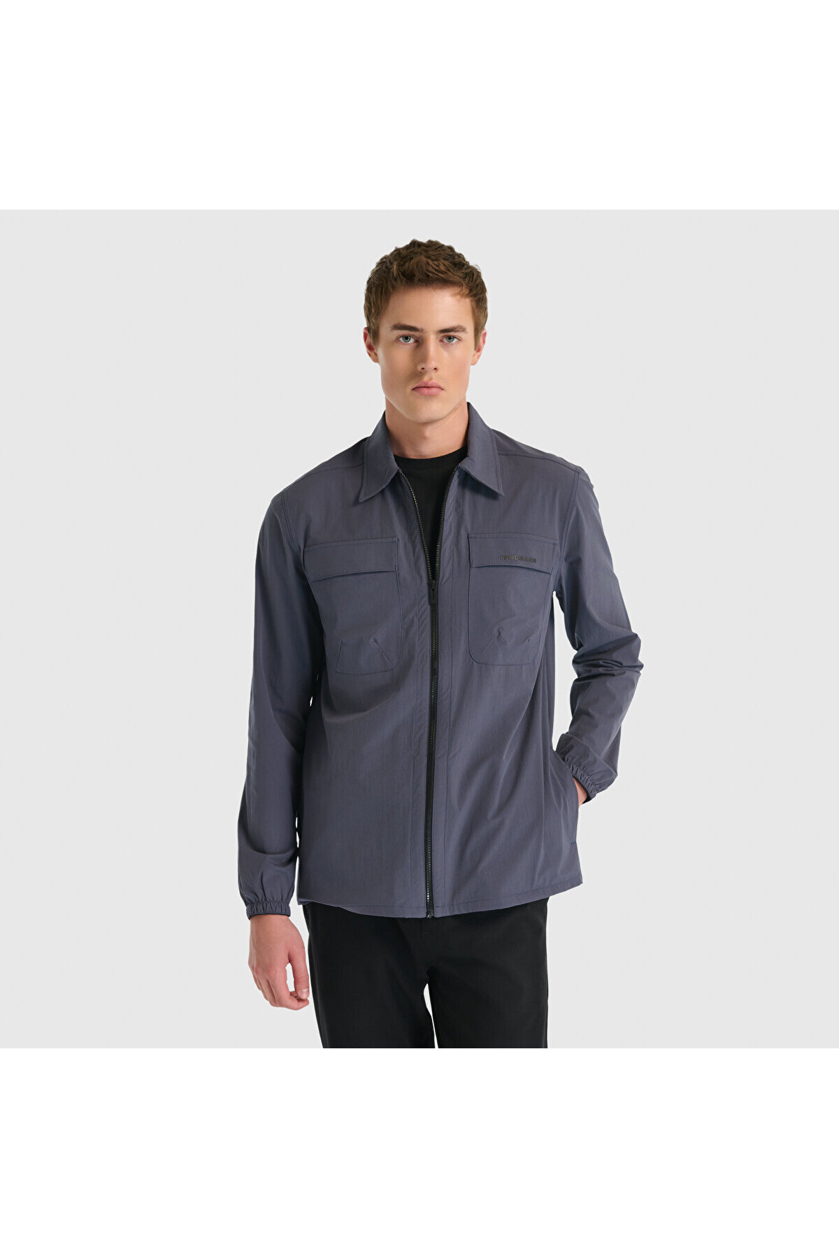 ژاکت و جلیقه مردانه آنتراسیت MNJ3548 نیو بالانس بارانی اسپرت New Balance