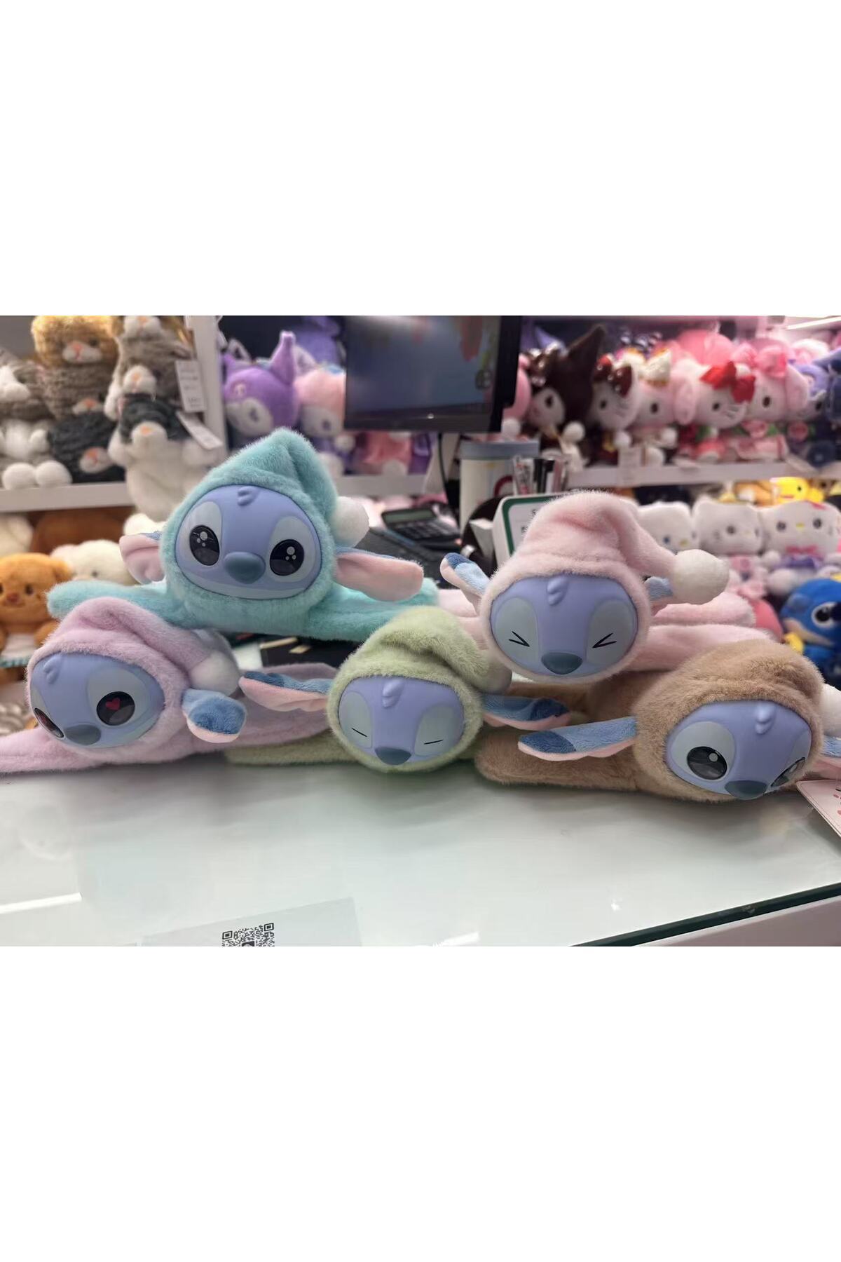 NB market Stitch peluş oyuncak kola takılan model pembe renk müzikli ışıklı ve kuyruğu dönen stich oyuncak fotoğrafı 4 (önizleme)