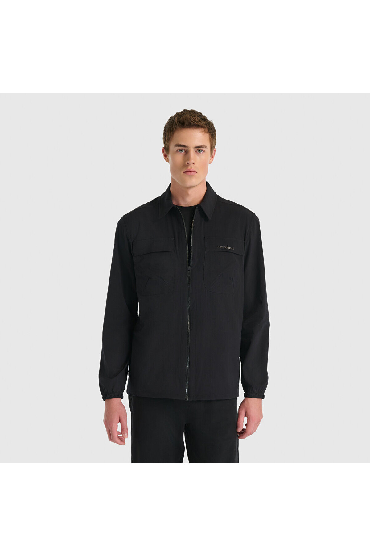 ژاکت و جلیقه مردانه مشکی MNJ3548 نیو بالانس بارانی اسپرت New Balance