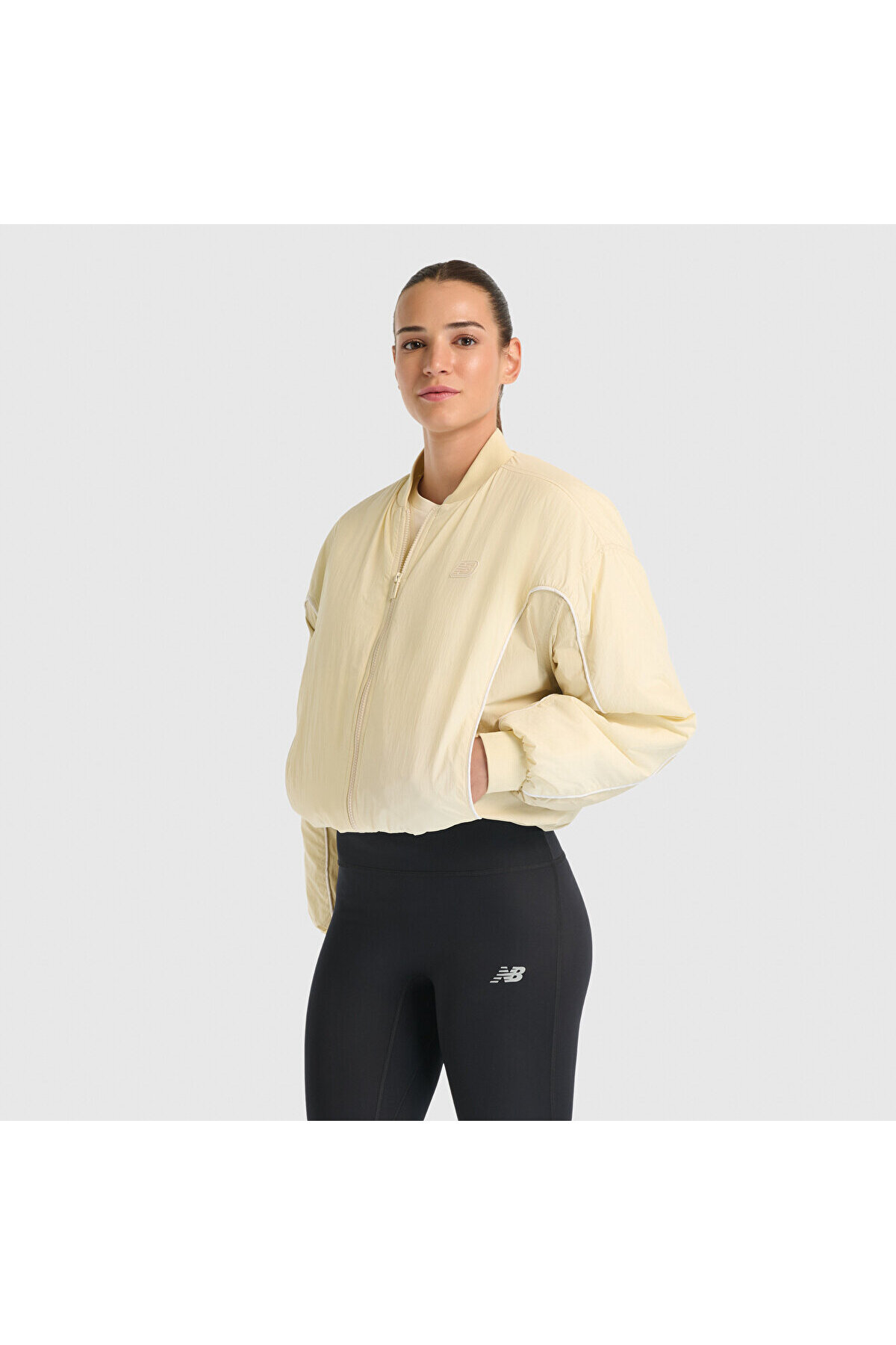 New Balance WNJ3541 Bej Kadın Mont & Yelek
