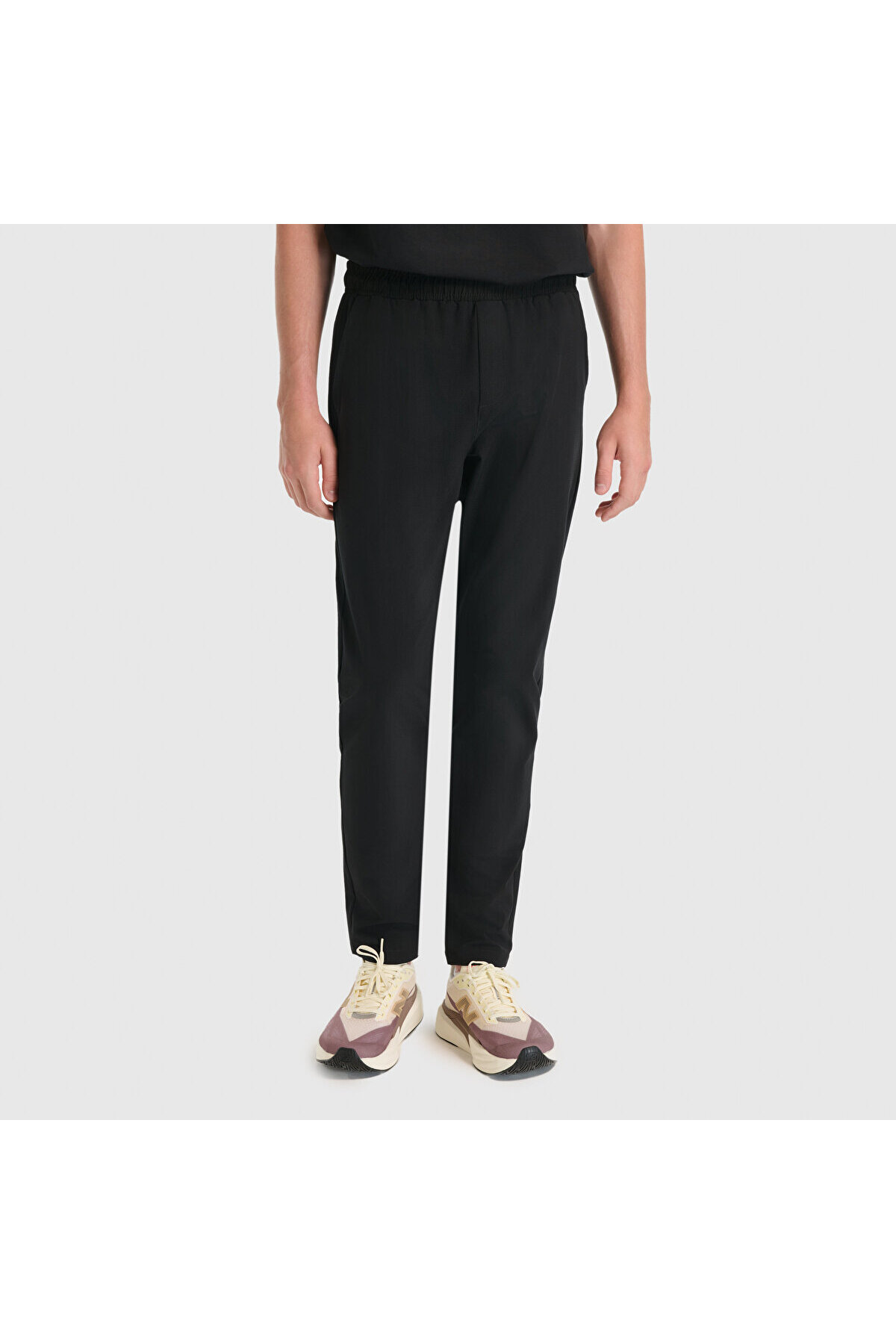 شلوار ورزشی مردانه مشکی MNP3547 نیو بالانس شلوار گرمکن ورزشی New Balance