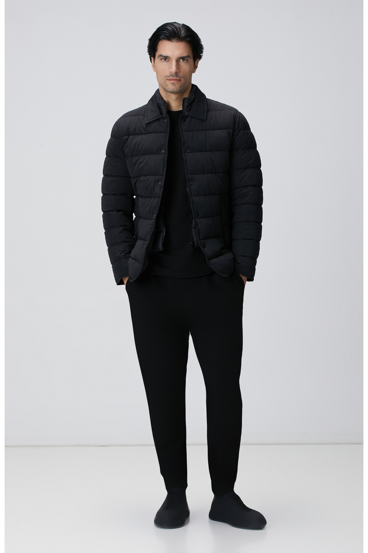 نتورک شلوار ورزشی مشکی ساده با جیب‌های کناری